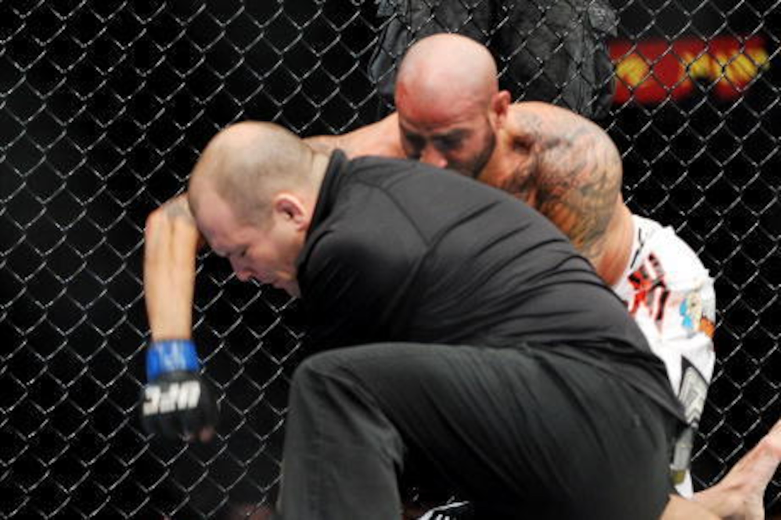 LAS VEGAS - NOVEMBER 21: Ben Saunders (R) knocks out Marcus Davis (L) during their Welterweight Fight at the UFC 106 at Mandalay Bay Events Center on November 21, 2009 in Las Vegas, Nevada. (Photo by Jon Kopaloff/Getty Images)