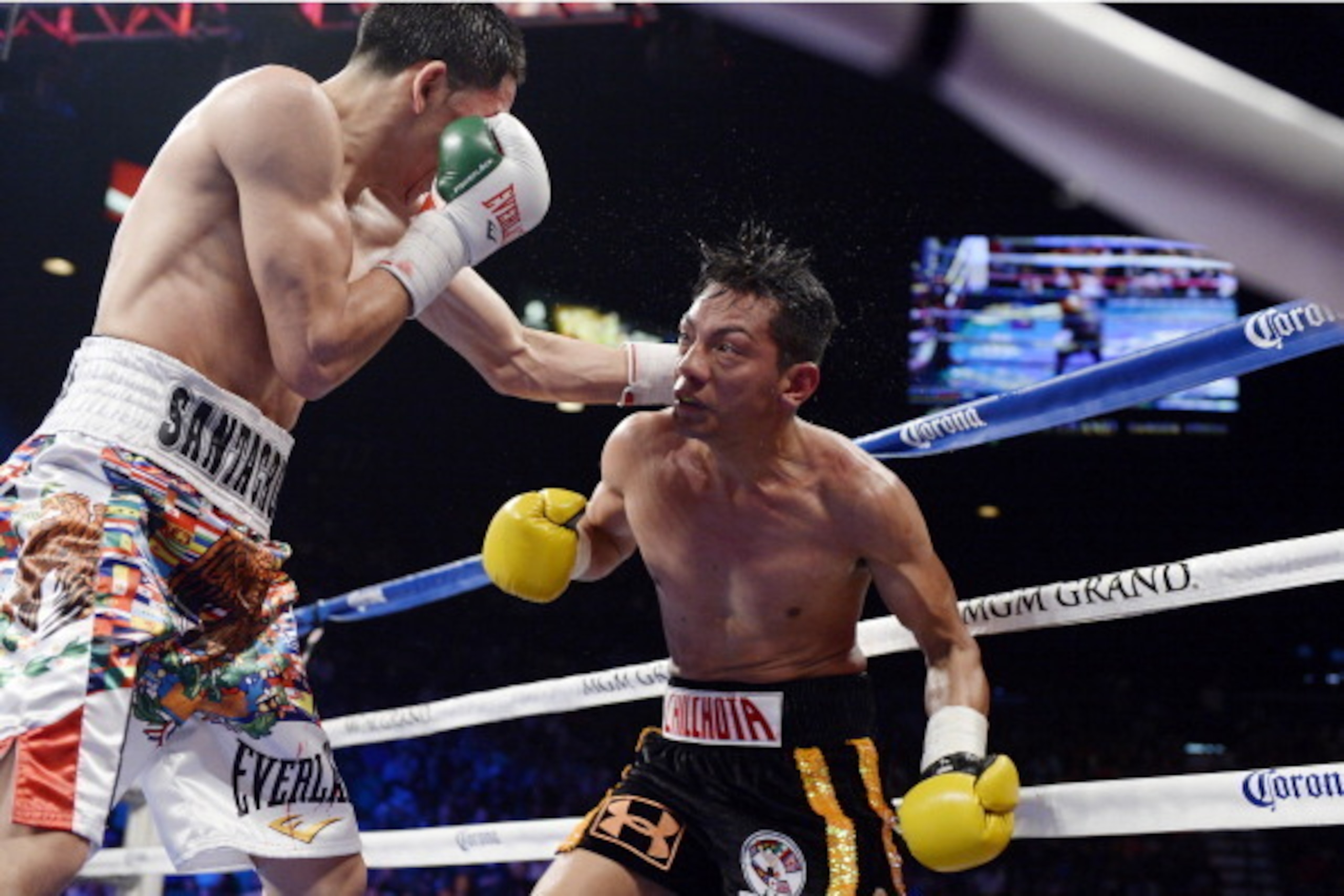 LAS VEGAS-NV-MARCH 8: Leo Santa Cruz (L) throws a punch against Cristian Mijares during the WBC super bantamweight title bout at the MGM Grand Garden March 8, 2014, in Las Vegas, Nevada. (Photo by Kevork Djansezian/Getty Images)