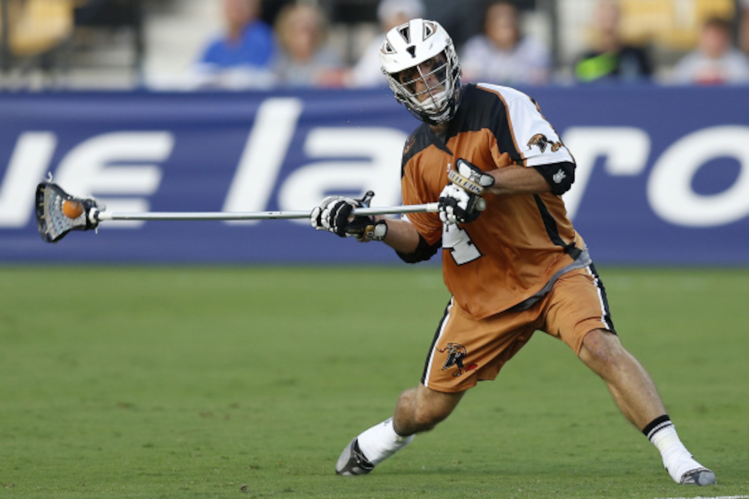 KENNESAW, GA - AUGUST 23:  Defender John Locascio #4 of the Rochester Rattlers shoots during the 2014 Major League Lacrosse Championship Game against the Denver Outlaws at Fifth Third Bank Stadium on August 23, 2014 in Kennesaw, Georgia.  (Photo by Mike Z