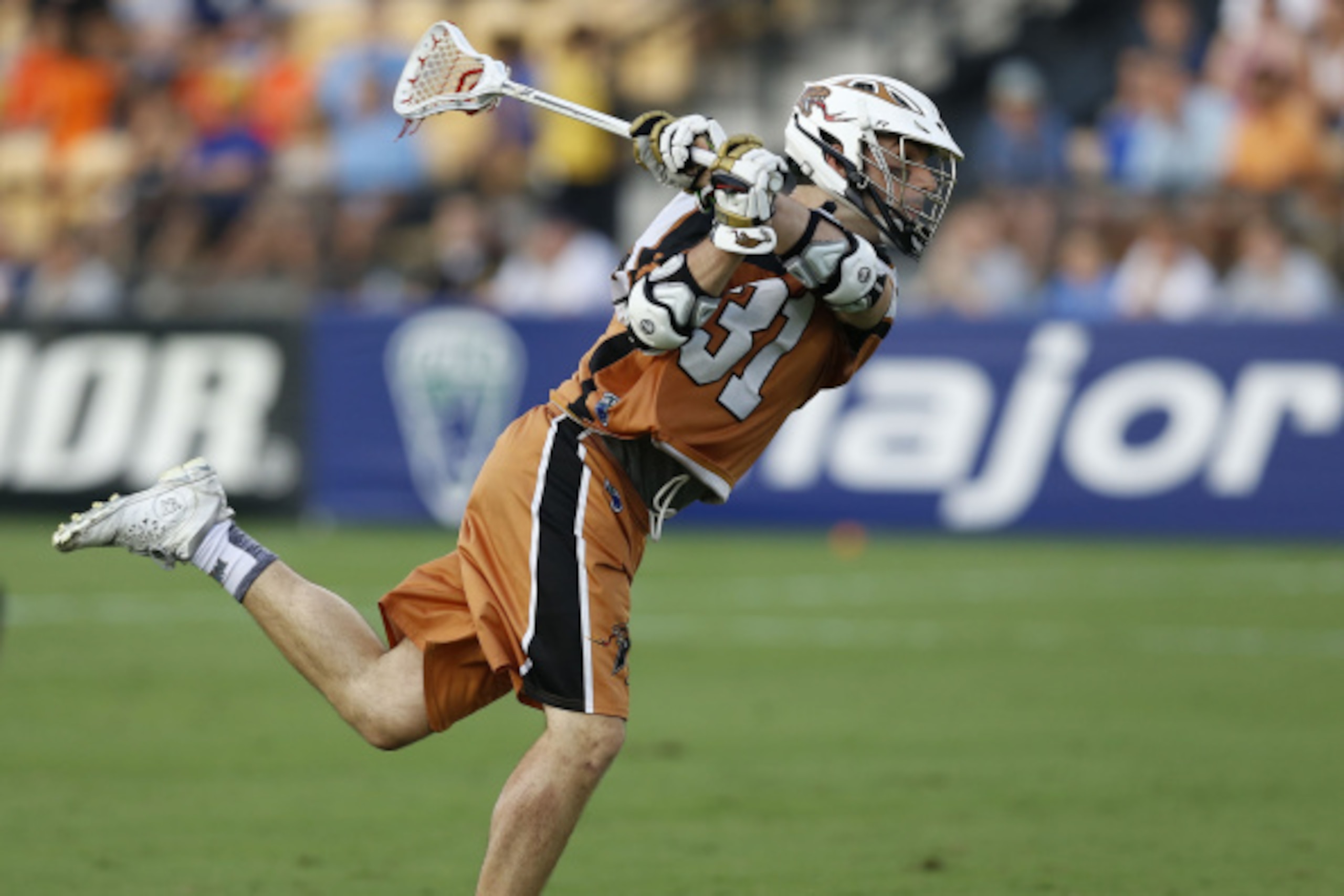 KENNESAW, GA - AUGUST 23:  Midfielder John Ranagan #31 of the Denver Outlaws shoots and scores during the 2014 Major League Lacrosse Championship Game against the Rochester Rattlers at Fifth Third Bank Stadium on August 23, 2014 in Kennesaw, Georgia.  (Ph