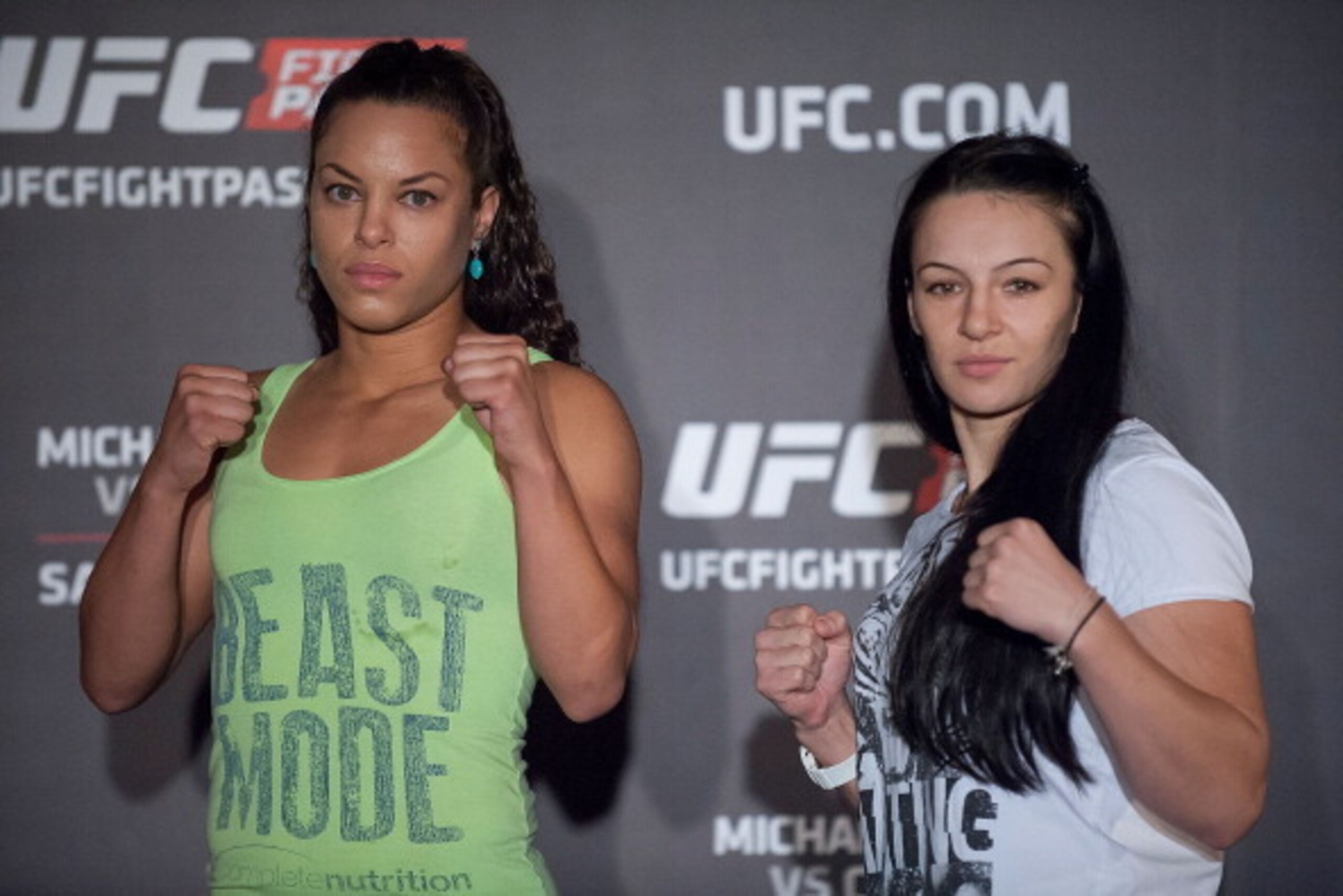 HONG KONG - AUGUST 20:  Elizabeth Phillips and Milana Dudieva at a face offs event during the Macao UFC Fight Night Press Conference at the Four Season Hotel on August 20, 2014 in Hong Kong.  (Photo by Anthony Kwan/Getty Images)