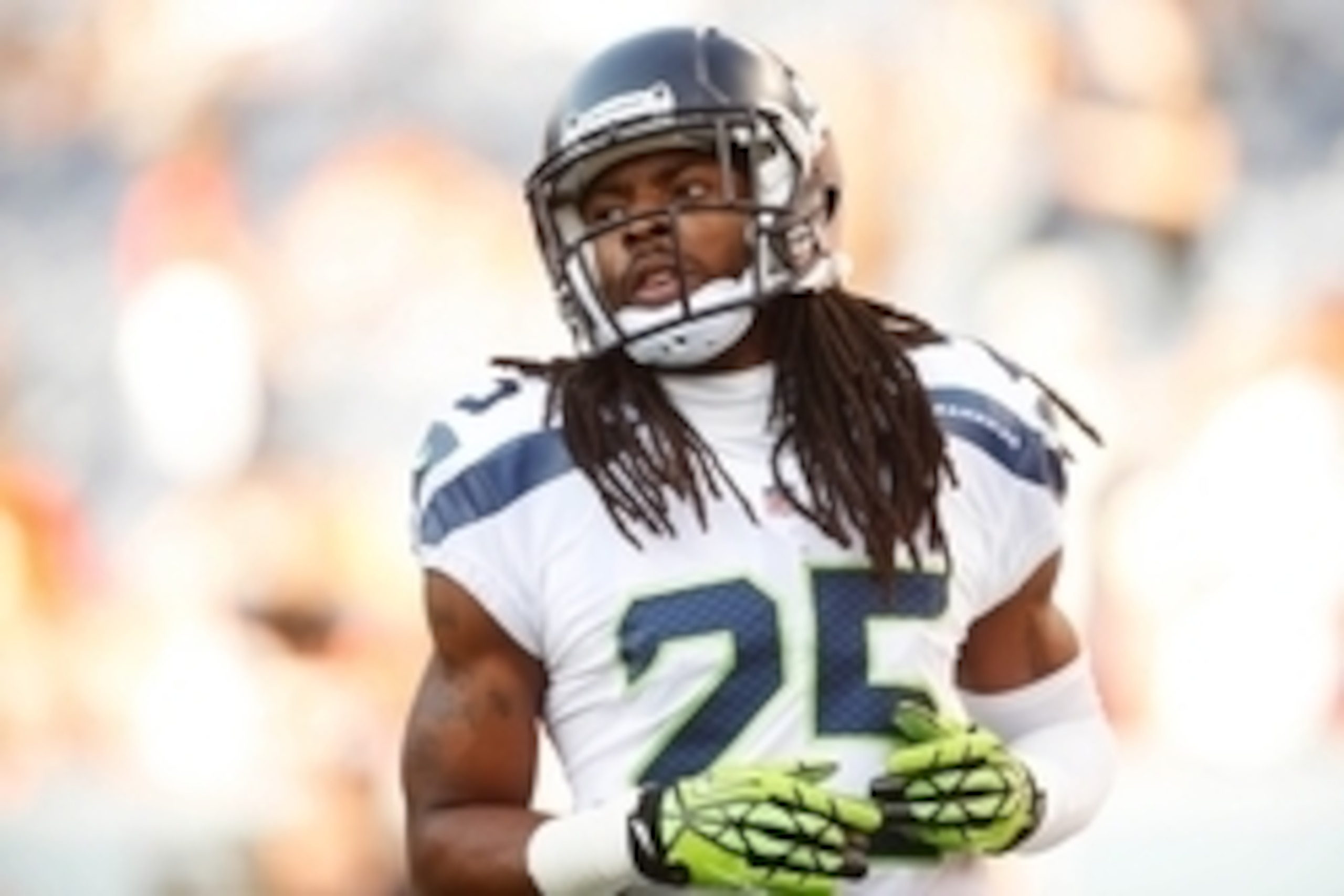 Aug 7, 2014; Denver, CO, USA; Seattle Seahawks cornerback Richard Sherman (25) before the preseason game against the Denver Broncos at Sports Authority Field at Mile High. Mandatory Credit: Chris Humphreys-USA TODAY Sports