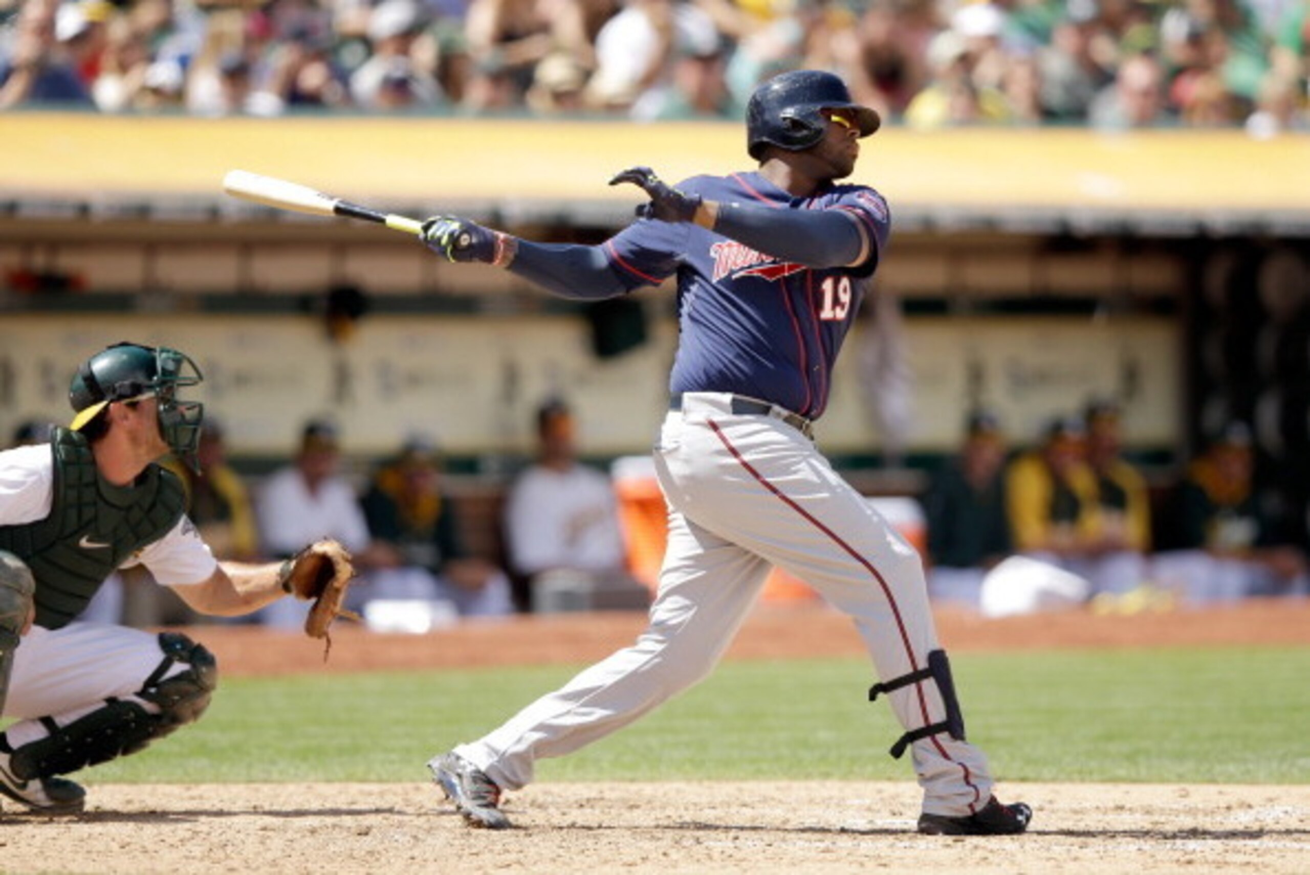 OAKLAND, CA - AUGUST 10:  Kennys Vargas #19 of the Minnesota Twins bats against the Oakland Athletics at O.co Coliseum on August 10, 2014 in Oakland, California.  (Photo by Ezra Shaw/Getty Images)