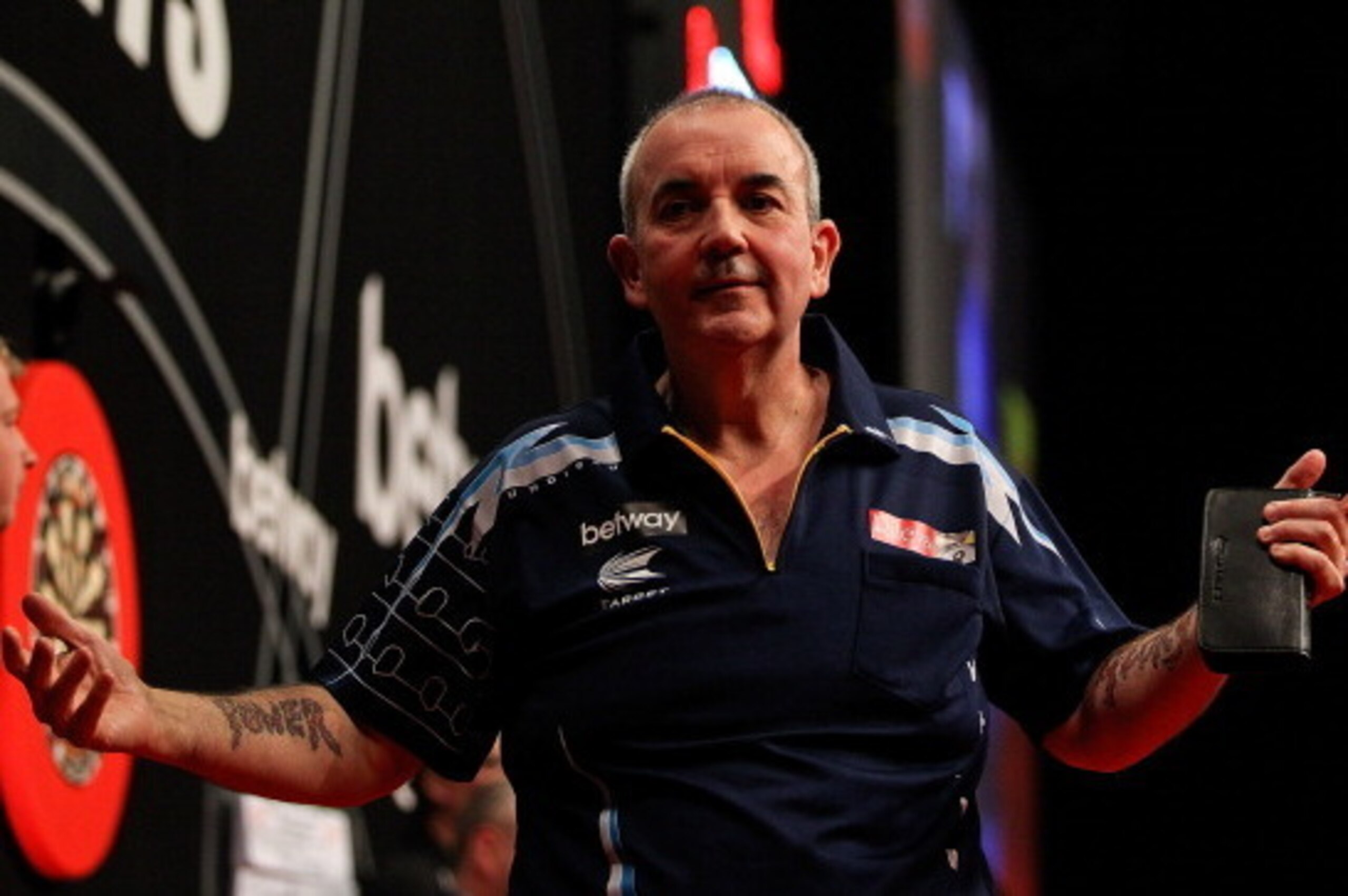 LONDON, ENGLAND - MAY 22:  Phil Taylor of England reacts during the McCoys Premier League Darts Play-Offs Semi Final match between Raymond van Barneveld and Phil Taylor at O2 Arena on May 22, 2014 in London, England.  (Photo by Ben Hoskins/Getty Images)