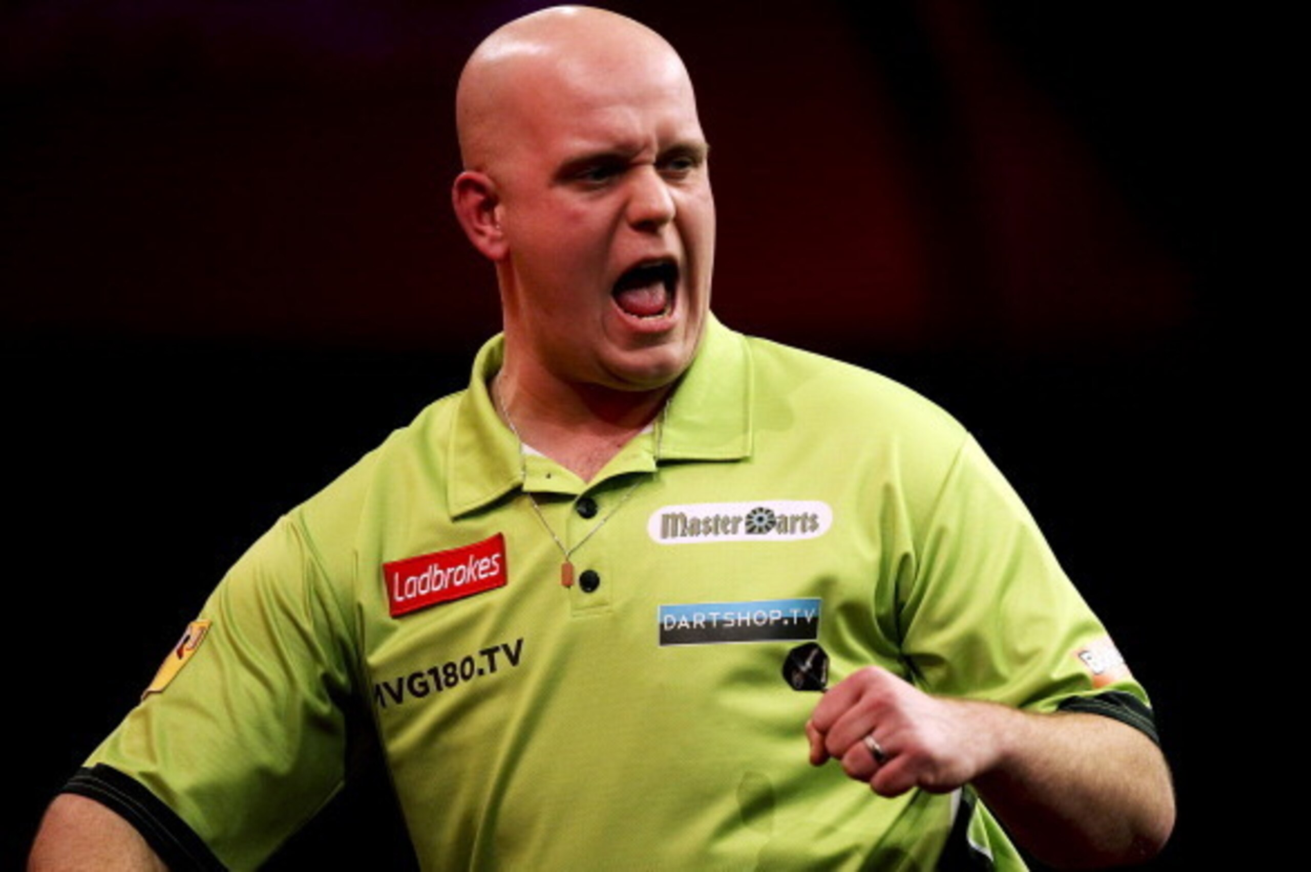 LONDON, ENGLAND - JANUARY 1: Michael van Gerwen of the Netherlands celebrates  against Phil Taylor of England during the final of the 2013 Ladbrokes.com World Darts Championship at the Alexandra Palace on January 1, 2013 in London, England. (Photo by Ben 