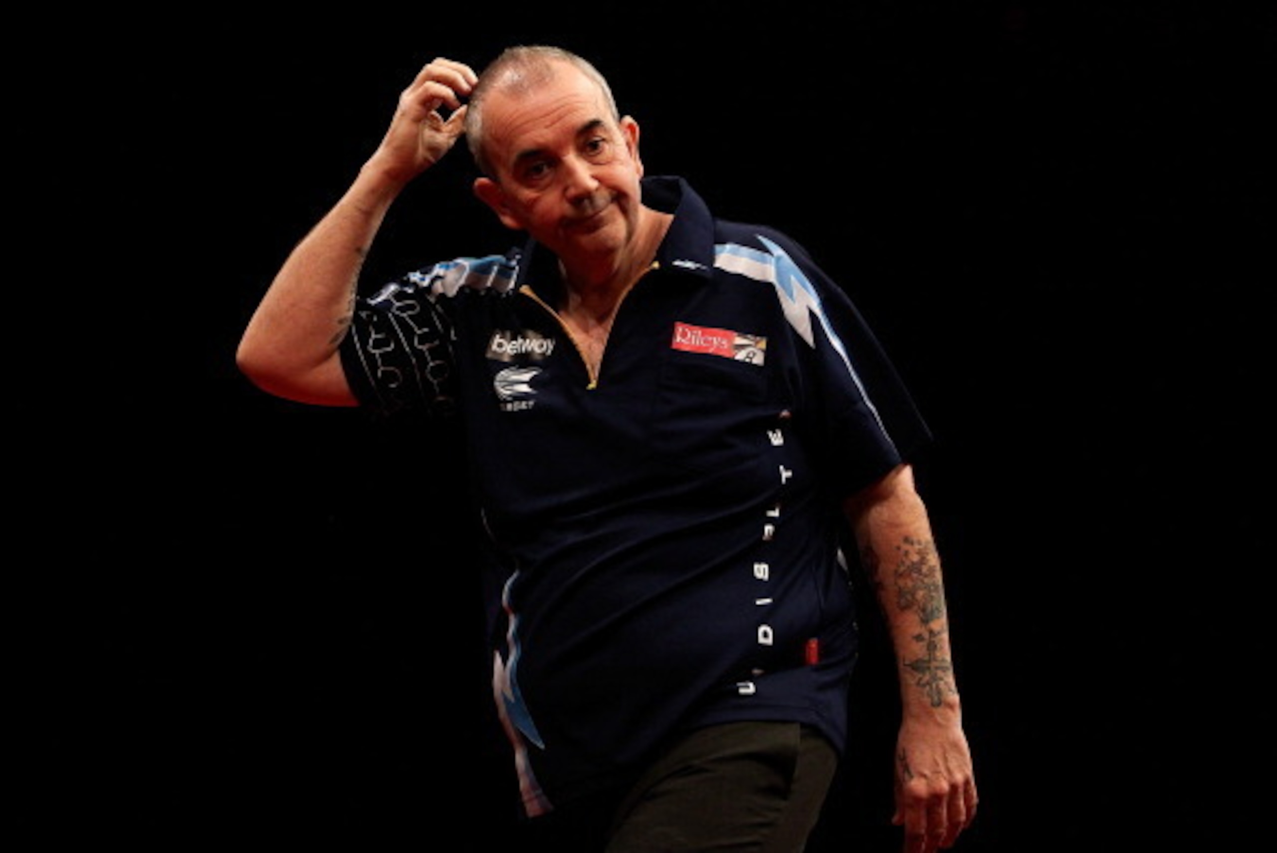 LONDON, ENGLAND - MAY 22:  Phil Taylor of England reacts during the McCoys Premier League Darts Play-Offs Semi Final match between Raymond van Barneveld and Phil Taylor at O2 Arena on May 22, 2014 in London, England.  (Photo by Ben Hoskins/Getty Images)
