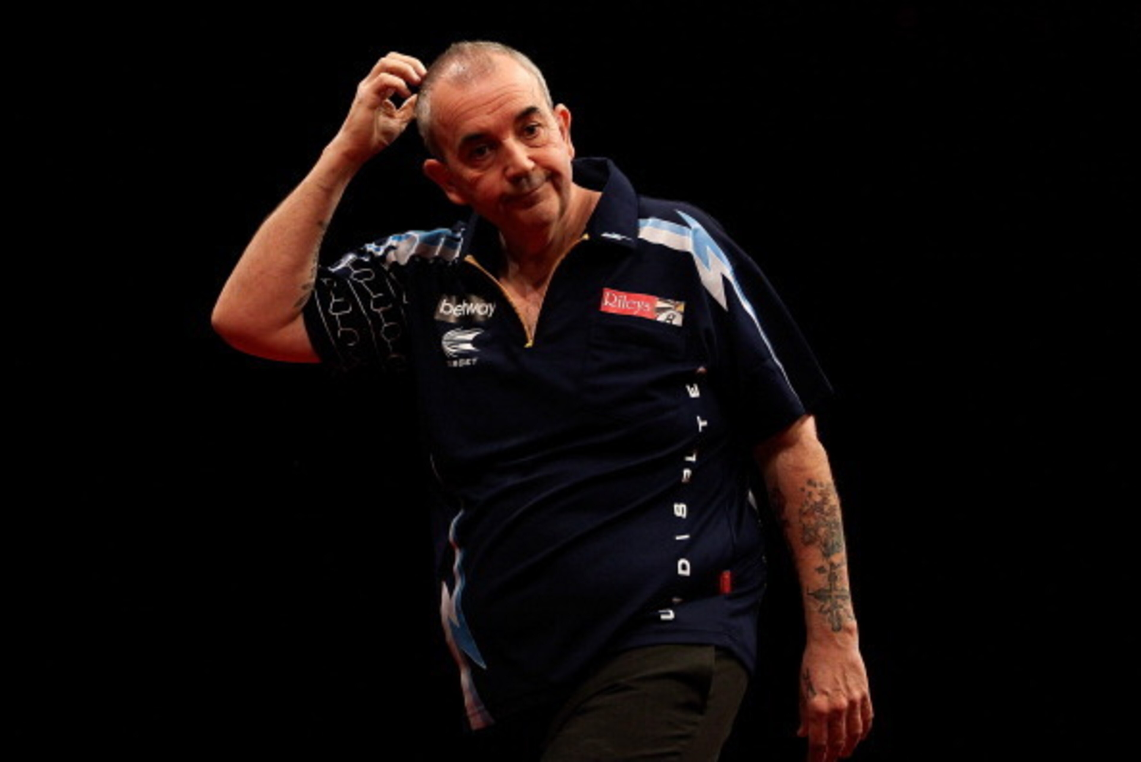 LONDON, ENGLAND - MAY 22:  Phil Taylor of England reacts during the McCoys Premier League Darts Play-Offs Semi Final match between Raymond van Barneveld and Phil Taylor at O2 Arena on May 22, 2014 in London, England.  (Photo by Ben Hoskins/Getty Images)