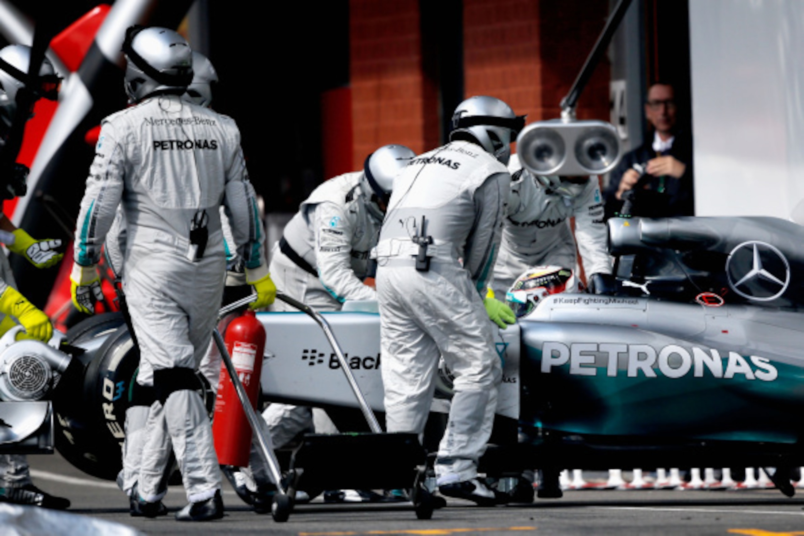 SPA, BELGIUM - AUGUST 24: Lewis Hamilton of Great Britain and Mercedes GP is pushed back into the garage after retiring during the Belgian Grand Prix at Circuit de Spa-Francorchamps on August 24, 2014 in Spa, Belgium. (Photo by Dean Mouhtaropoulos/Getty SPA, BELGIUM - AUGUST 24: Lewis Hamilton of Great Britain and Mercedes GP is pushed back into the garage after retiring during the Belgian Grand Prix at Circuit de Spa-Francorchamps on August 24, 2014 in Spa, Belgium. (Photo by Dean Mouhtaropoulos/Getty