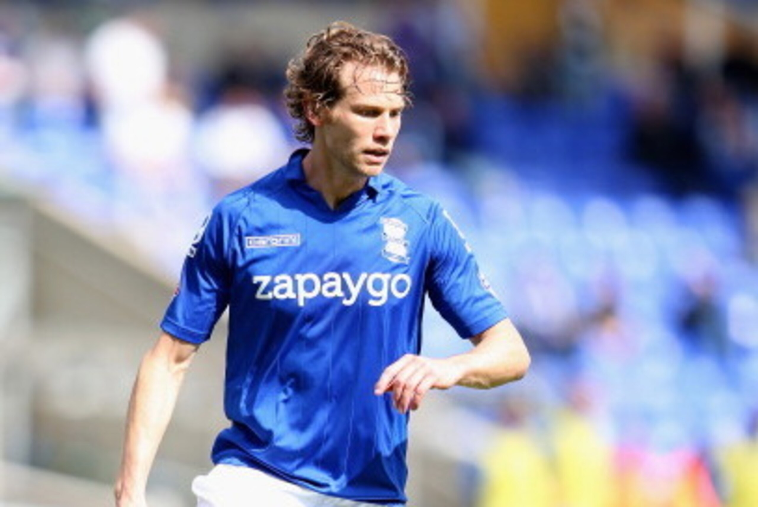 BIRMINGHAM, ENGLAND - AUGUST 16:  Jonathan Spector of Birmingham City in action during the Sky Bet Championship match between Birmingham City and Brighton & Hove Albion at St Andrews (stadium) on August 16, 2014 in Birmingham, England.  (Photo by Mark Tho
