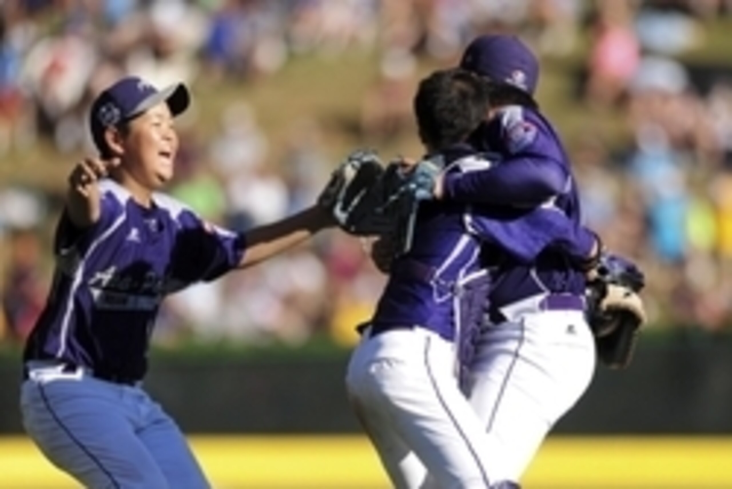 Aug 24, 2014; South Williamsport, PA, USA; Asia-Pacific Region players react after beating the Great Lakes Region 8-4 at Howard J. Lamade Stadium. Mandatory Credit: Evan Habeeb-USA TODAY Sports Aug 24, 2014; South Williamsport, PA, USA; Asia-Pacific Region players react after beating the Great Lakes Region 8-4 at Howard J. Lamade Stadium. Mandatory Credit: Evan Habeeb-USA TODAY Sports