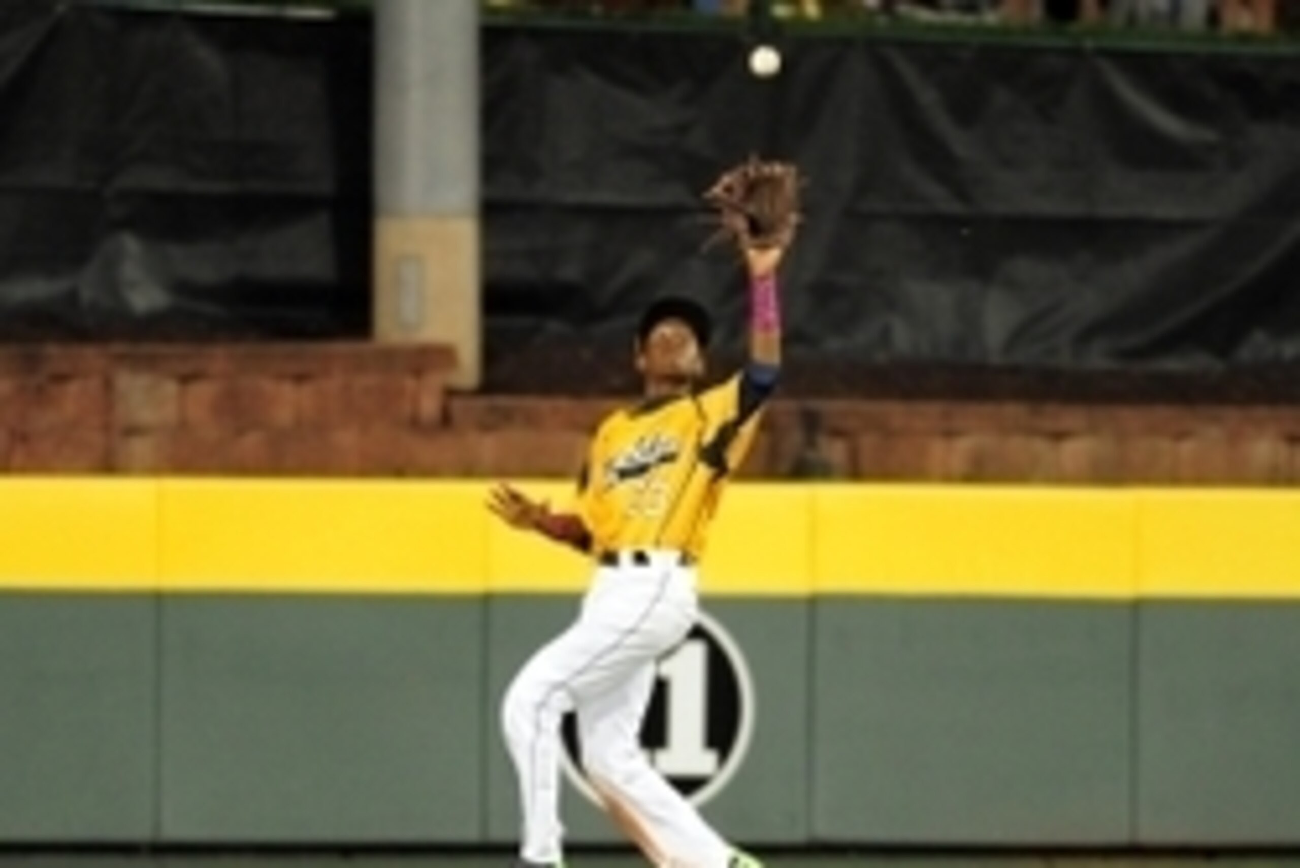 Aug 21, 2014; South Williamsport, PA, USA; Great Lakes Region outfielder Pierce Jones (23) catches a fly ball in the game against the Mid-Atlantic Region at Howard J. Lamade Stadium. Mandatory Credit: Evan Habeeb-USA TODAY Sports Aug 21, 2014; South Williamsport, PA, USA; Great Lakes Region outfielder Pierce Jones (23) catches a fly ball in the game against the Mid-Atlantic Region at Howard J. Lamade Stadium. Mandatory Credit: Evan Habeeb-USA TODAY Sports