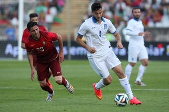 LISBON, PORTUGAL - MAY 31:  Kostas Manolas of Greece in action during the International Friendly between Portugal and Greece at the National Stadium on May 31, 2014 in Lisbon, Portugal. (Photo by Gualter Fatia/Getty Images)