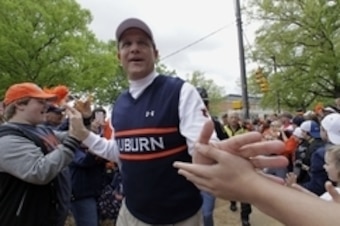Apr 19, 2014; Auburn, AL, USA;  Auburn Tigers head coach Gus Malzahn leads the team through Tiger Walk prior to the start of the A-Day spring game at Jordan Hare Stadium. Mandatory Credit: John Reed-USA TODAY Sports