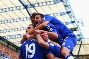 LONDON, ENGLAND - AUGUST 23:  Diego Costa of Chelsea is mobbed by team mates after scoring their first goal during the Barclays Premier League match between Chelsea and Leicester City at Stamford Bridge on August 23, 2014 in London, England.  (Photo by Pa