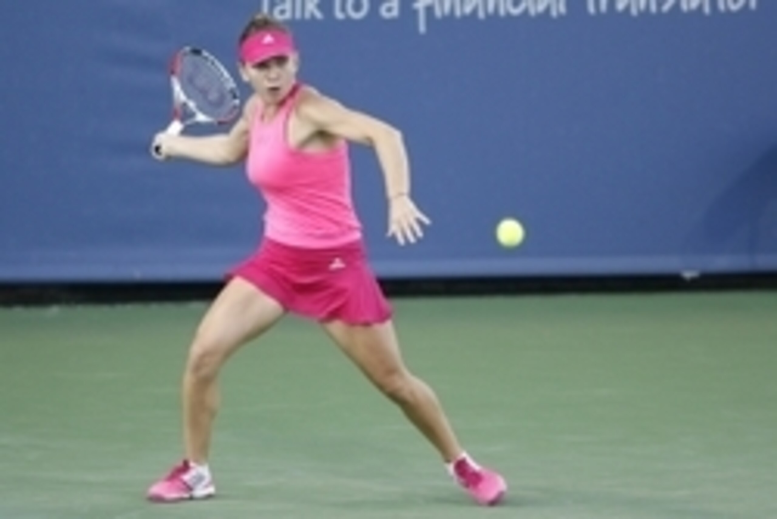 Aug 15, 2014; Cincinnati, OH, USA; Simona Halep returns the shot of Maria Sharapova on day five of the Western and Southern Open tennis tournament at Linder Family Tennis Center. Mandatory Credit: Mark Zerof-USA TODAY Sports