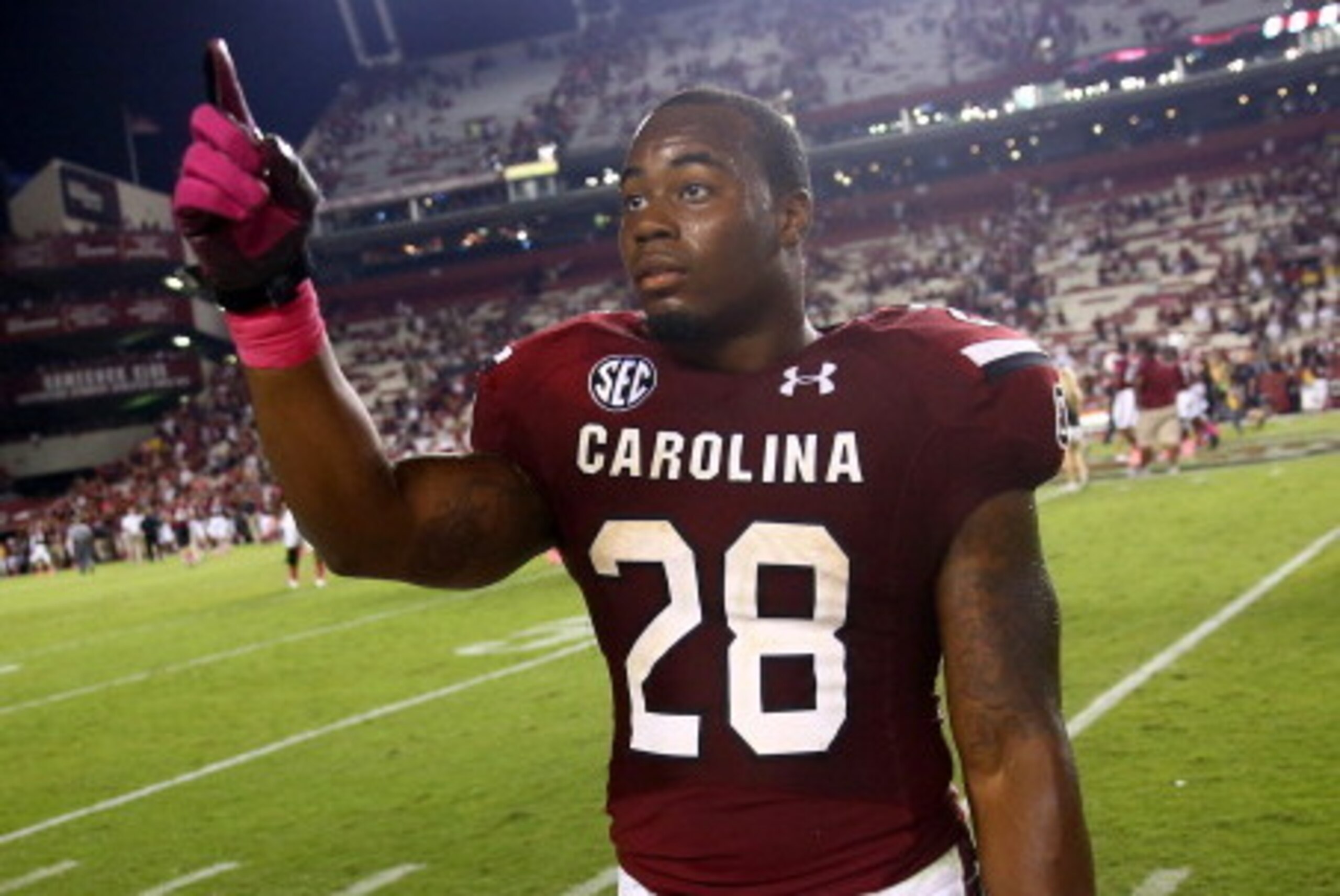 COLUMBIA, SC - OCTOBER 05:  Mike Davis #28 of the South Carolina Gamecocks celebrates after defeating the Kentucky Wildcats at Williams-Brice Stadium on October 5, 2013 in Columbia, South Carolina.  (Photo by Streeter Lecka/Getty Images)