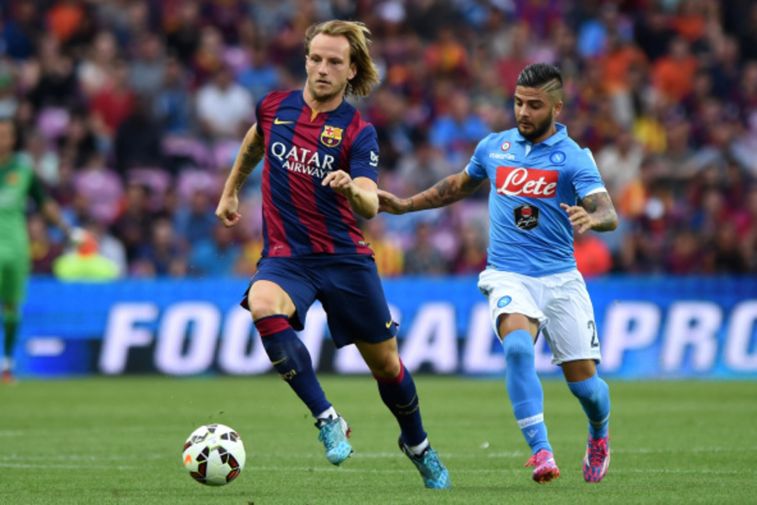 GENEVA, SWITZERLAND - AUGUST 06: Ivan Rakitic (L) of FC Barcelona in action against Lorenzo Insigne of SSC Napoli during the pre-season friendly match between FC Barcelona and SSC Napoli on August 6, 2014 in Geneva, Switzerland. (Photo by Valerio Pennic GENEVA, SWITZERLAND - AUGUST 06: Ivan Rakitic (L) of FC Barcelona in action against Lorenzo Insigne of SSC Napoli during the pre-season friendly match between FC Barcelona and SSC Napoli on August 6, 2014 in Geneva, Switzerland. (Photo by Valerio Pennic