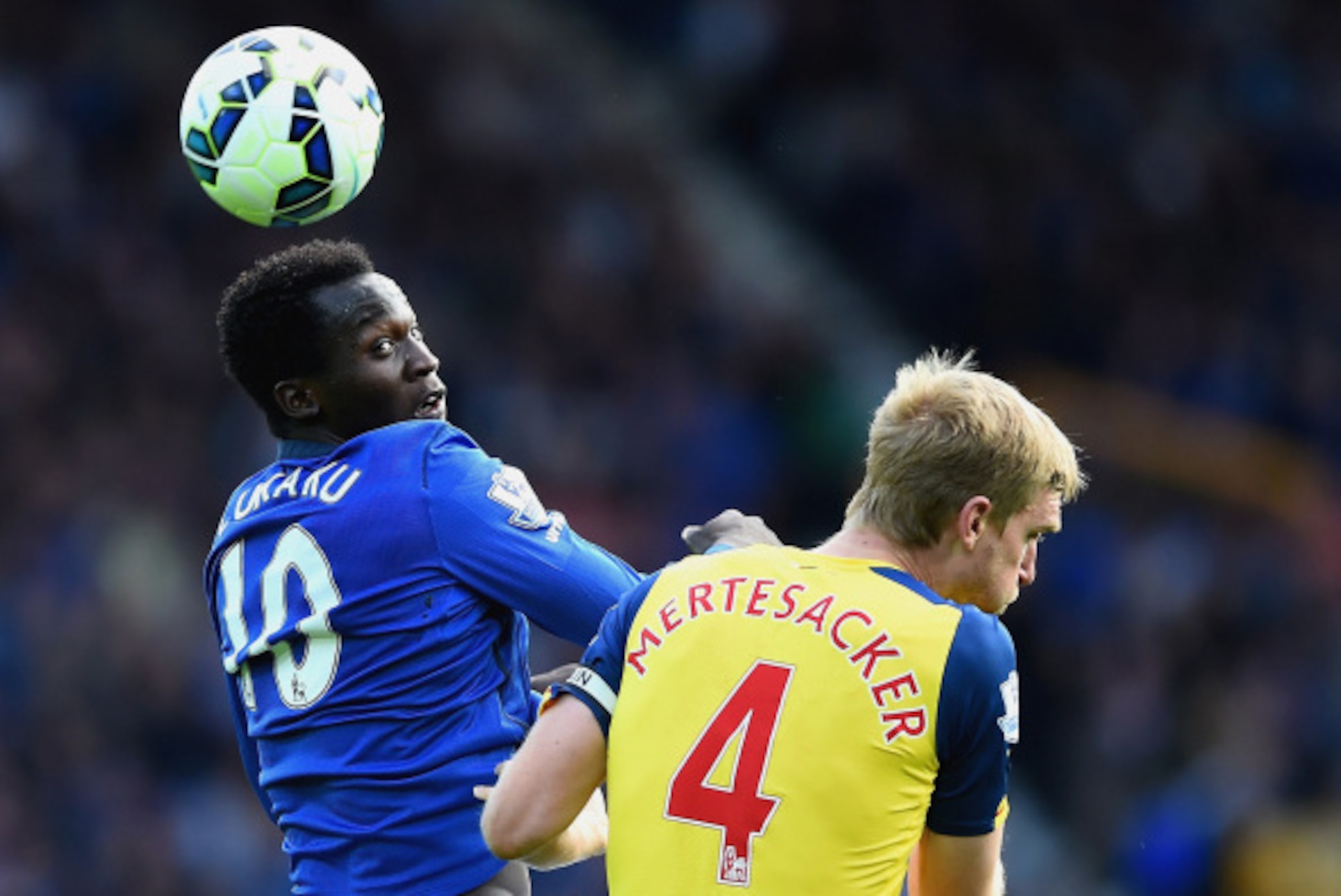 LIVERPOOL, ENGLAND - AUGUST 23: Per Mertesacker of Arsenal competes with Romelu Lukaku of Everton during the Barclays Premier League match between Everton and Arsenal at Goodison Park on August 23, 2014 in Liverpool, England. (Photo by Laurence Griffith LIVERPOOL, ENGLAND - AUGUST 23: Per Mertesacker of Arsenal competes with Romelu Lukaku of Everton during the Barclays Premier League match between Everton and Arsenal at Goodison Park on August 23, 2014 in Liverpool, England. (Photo by Laurence Griffith