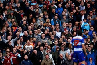 BURNLEY, ENGLAND - OCTOBER 26: Burnley fans chant abuse towards Joey Barton of QPR during the Sky Bet Championship match between Burnley and Queens Park Rangers at Turf Moor on October 26, 2013 in Burnley, England. (Photo by Paul Thomas/Getty Images)