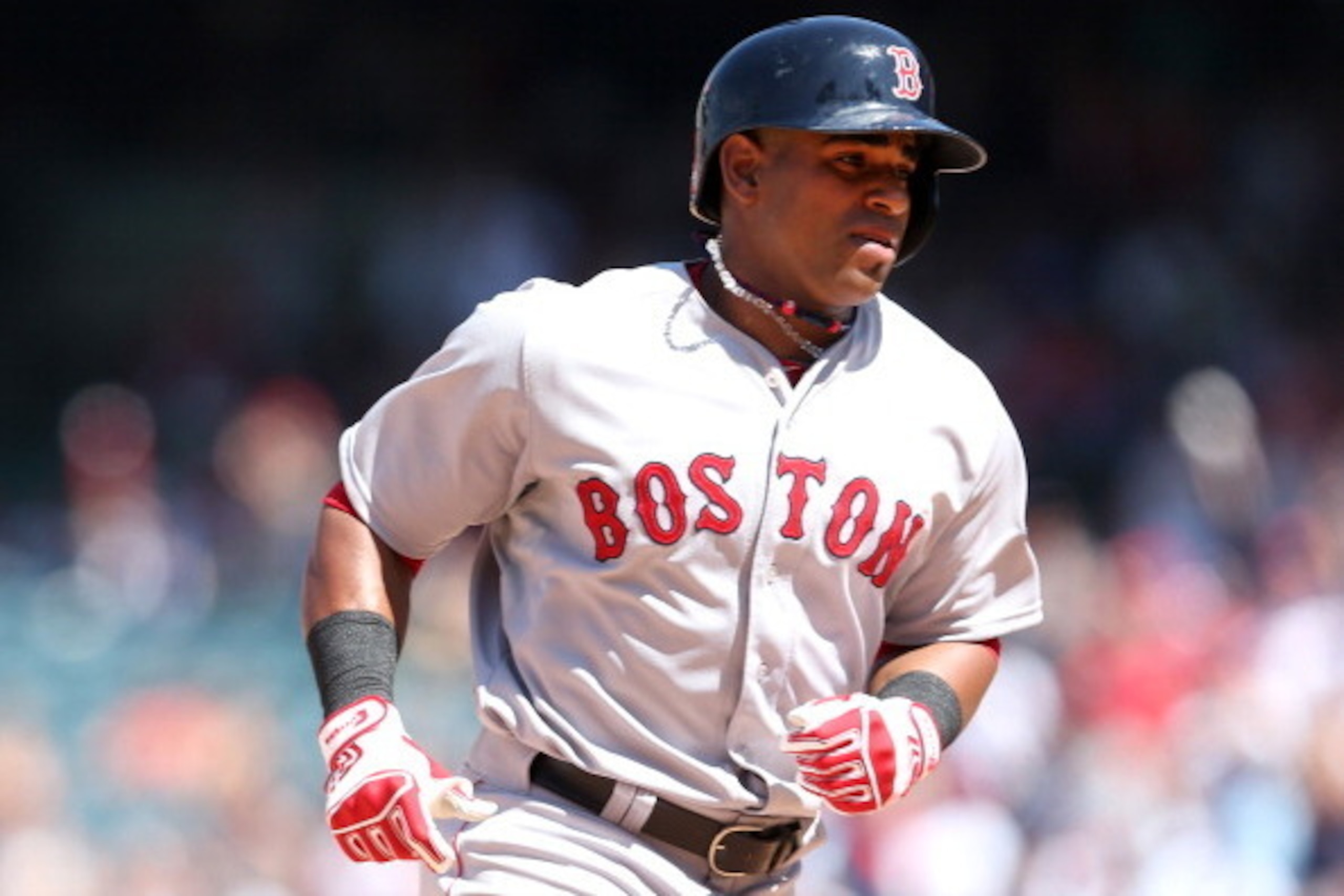 ANAHEIM, CA - AUGUST 10:  Yoenis Cedspedes #52 of the Boston Red Sox rounds the bases after hitting a three run home run to break a scoreless tie in the eighth inning against the Los Angeles Angels of Anaheim at Angel Stadium of Anaheim on August 10, 2014