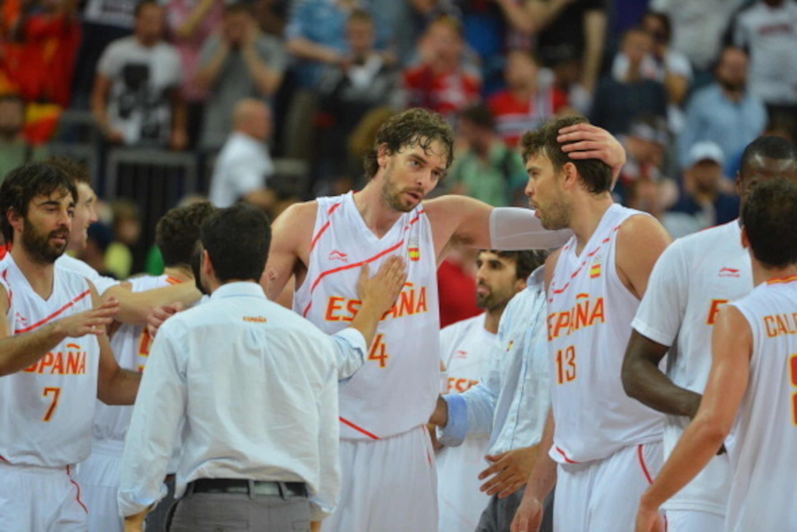 LONDON, ENGLAND - AUGUST 10: Pau Gasol #4 and Marc Gasol #13 of Spain celebrates against Russia during their Basketball Game on Day 14 of the London 2012 Olympic Games at the North Greenwich Arena on August 10, 2012 in London, England. NOTE TO USER: User 