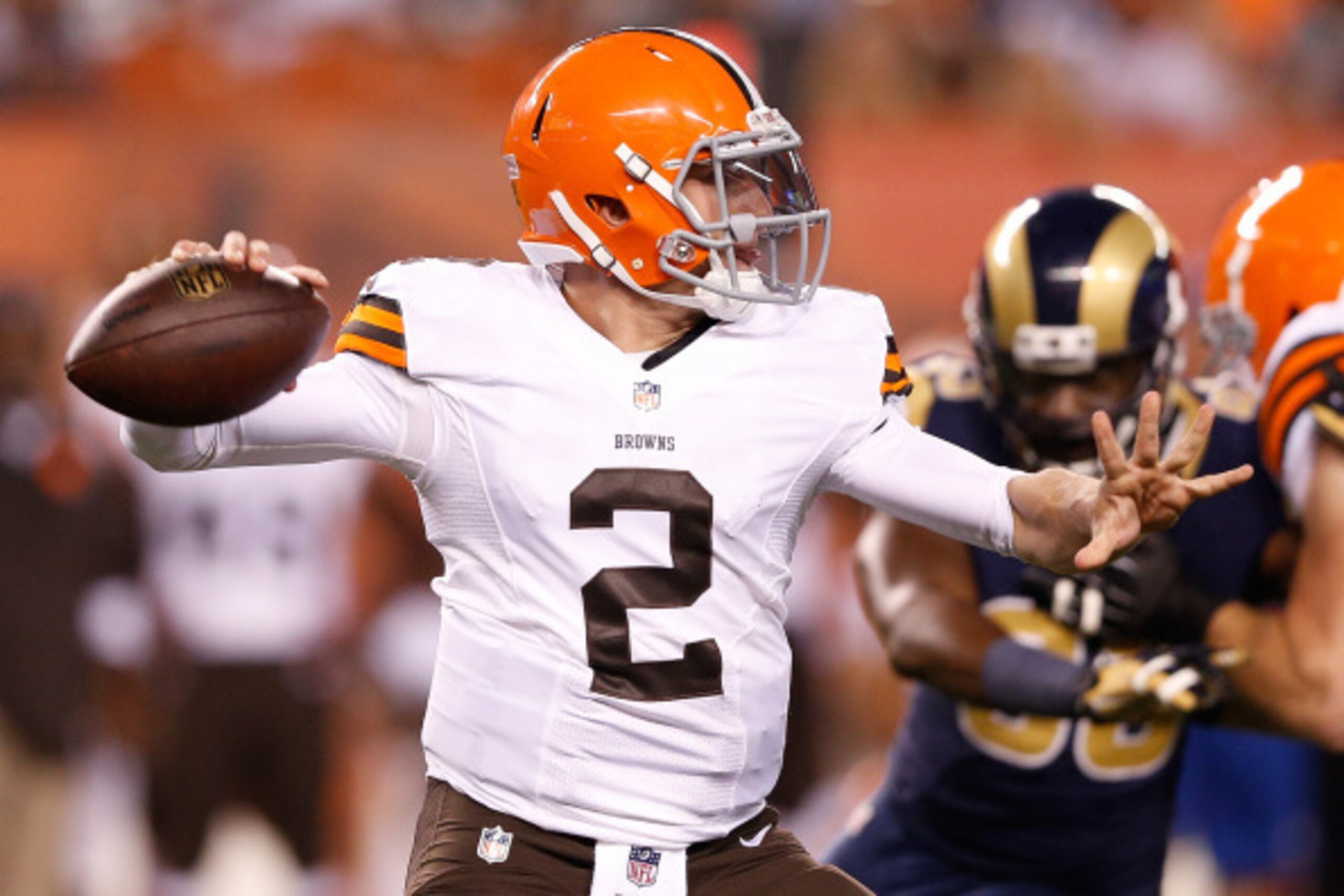 CLEVELAND, OH - AUGUST 23:  Johnny Manziel #2 of the Cleveland Browns throws a pass during the fourth quarter against the St. Louis Rams at FirstEnergy Stadium on August 23, 2014 in Cleveland, Ohio. St. Louis Rams won the game 33-14.  (Photo by Joe Robbin