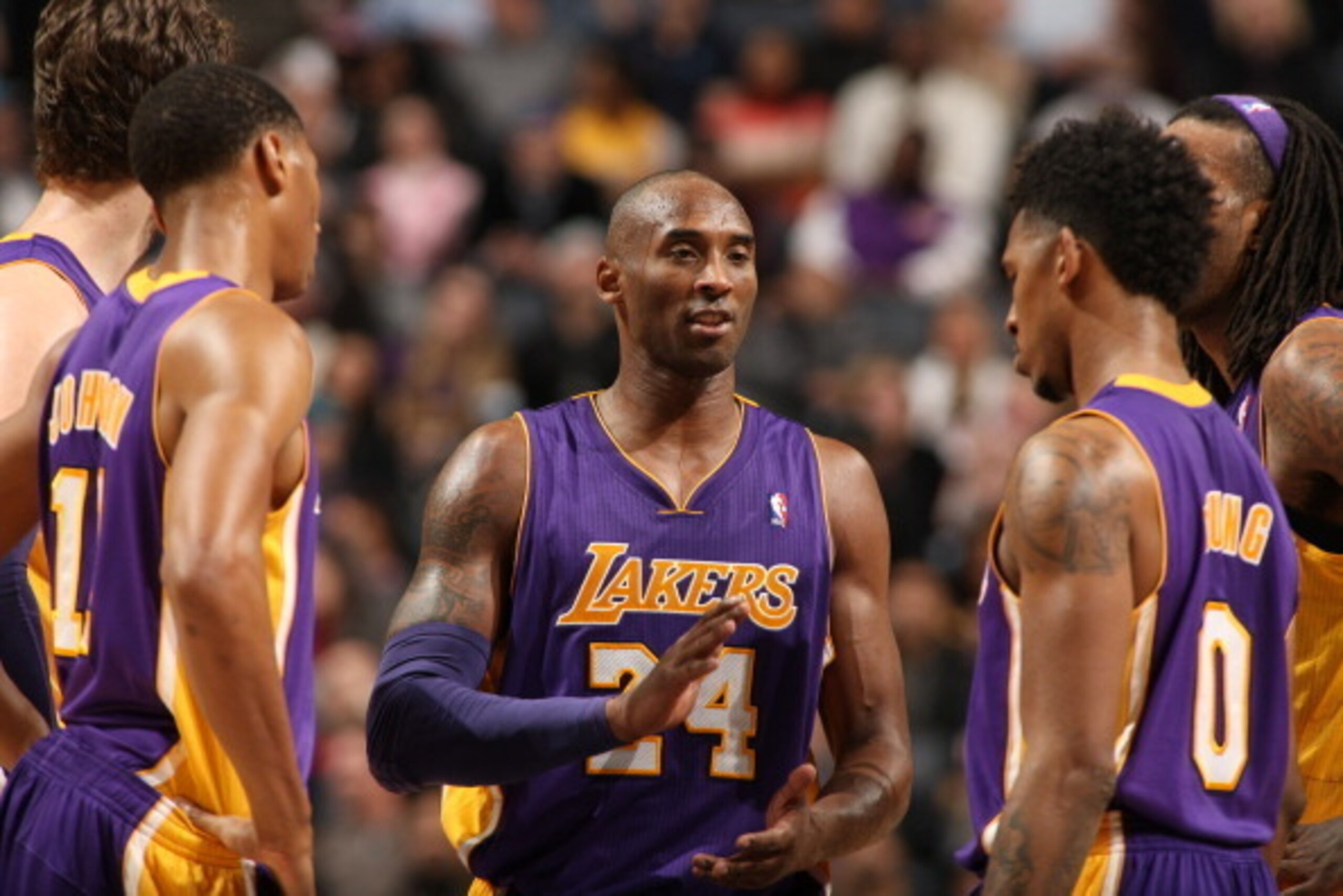 CHARLOTTE, NC - DECEMBER 14:  Kobe Bryant #24 and the Los Angeles Lakers during the game against the Charlotte Bobcats at the Time Warner Cable Arena on December 14, 2013 in Charlotte, North Carolina.  NOTE TO USER: User expressly acknowledges and agrees 