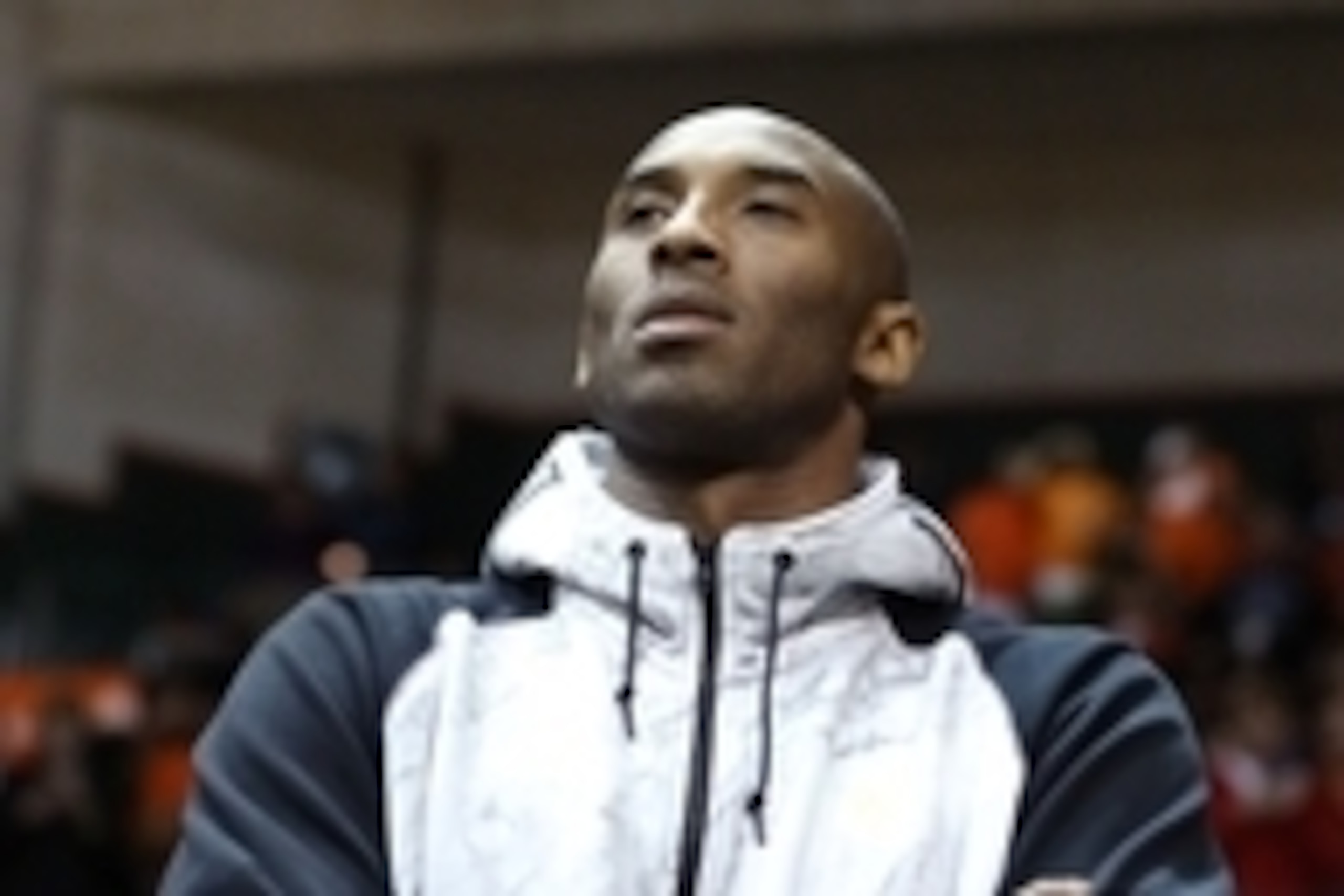Jan 22, 2014; Coral Gables, FL, USA; Los Angeles Lakers shooting guard Kobe Bryant watches the game between the Duke Blue Devils Miami Hurricanes in the first half at BankUnited Center. Mandatory Credit: Robert Mayer-USA TODAY Sports