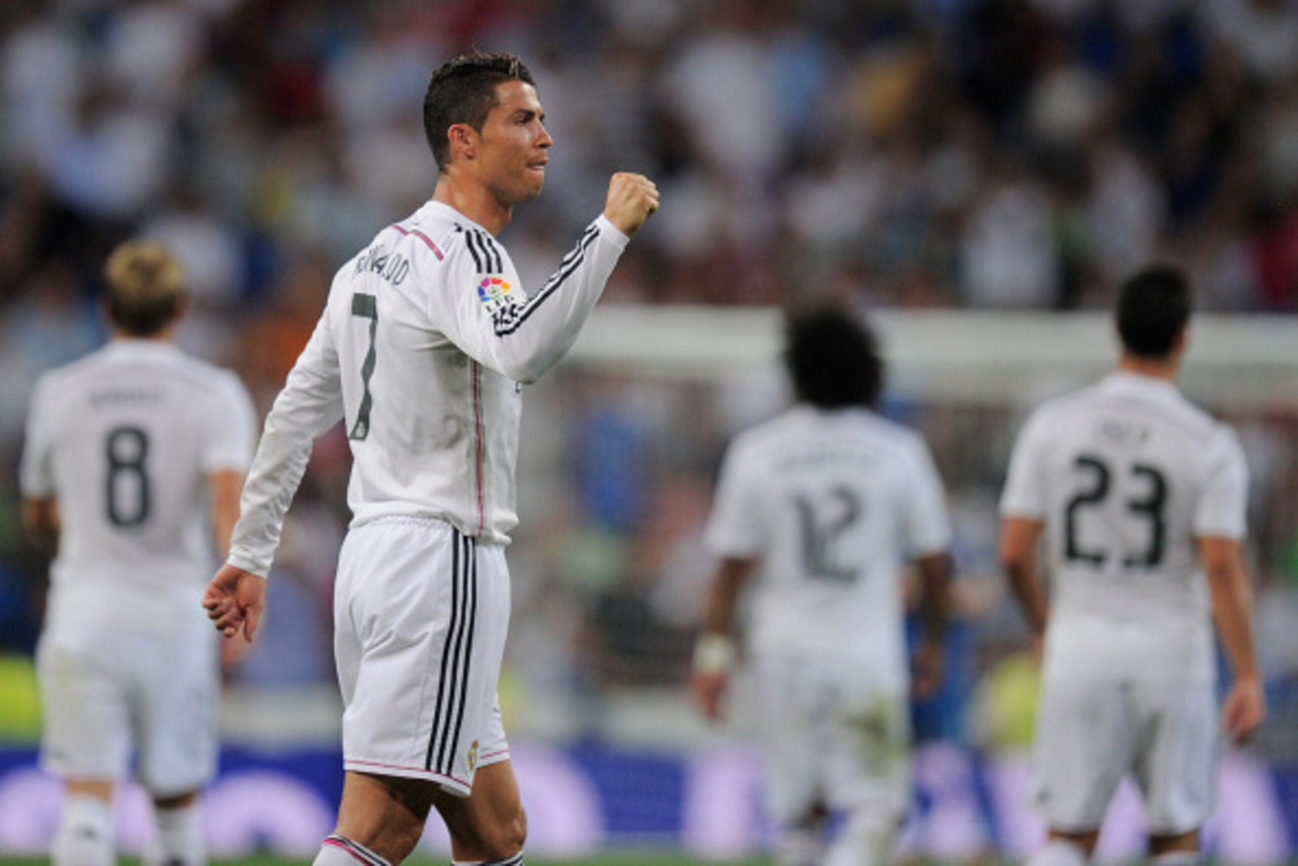 MADRID, SPAIN - AUGUST 25:  Cristiano Ronaldo of Real Madrid celebrates after scoring Real's 2nd goal during the La liga match between Real Madrid CF and Cordoba CF at Estadio Santiago Bernabeu on August 25, 2014 in Madrid, Spain.  (Photo by Denis Doyle/G