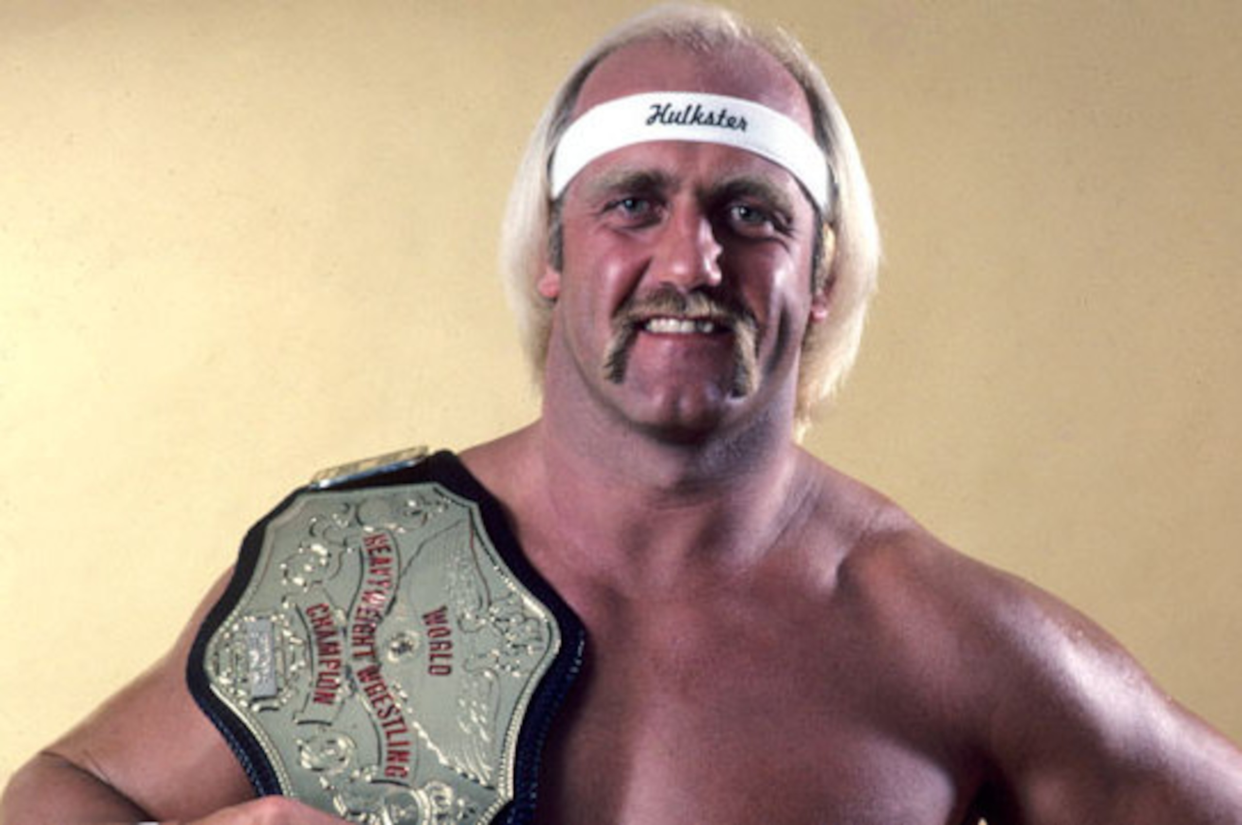 Hulk Hogan with his 1984 version of the WWE title.