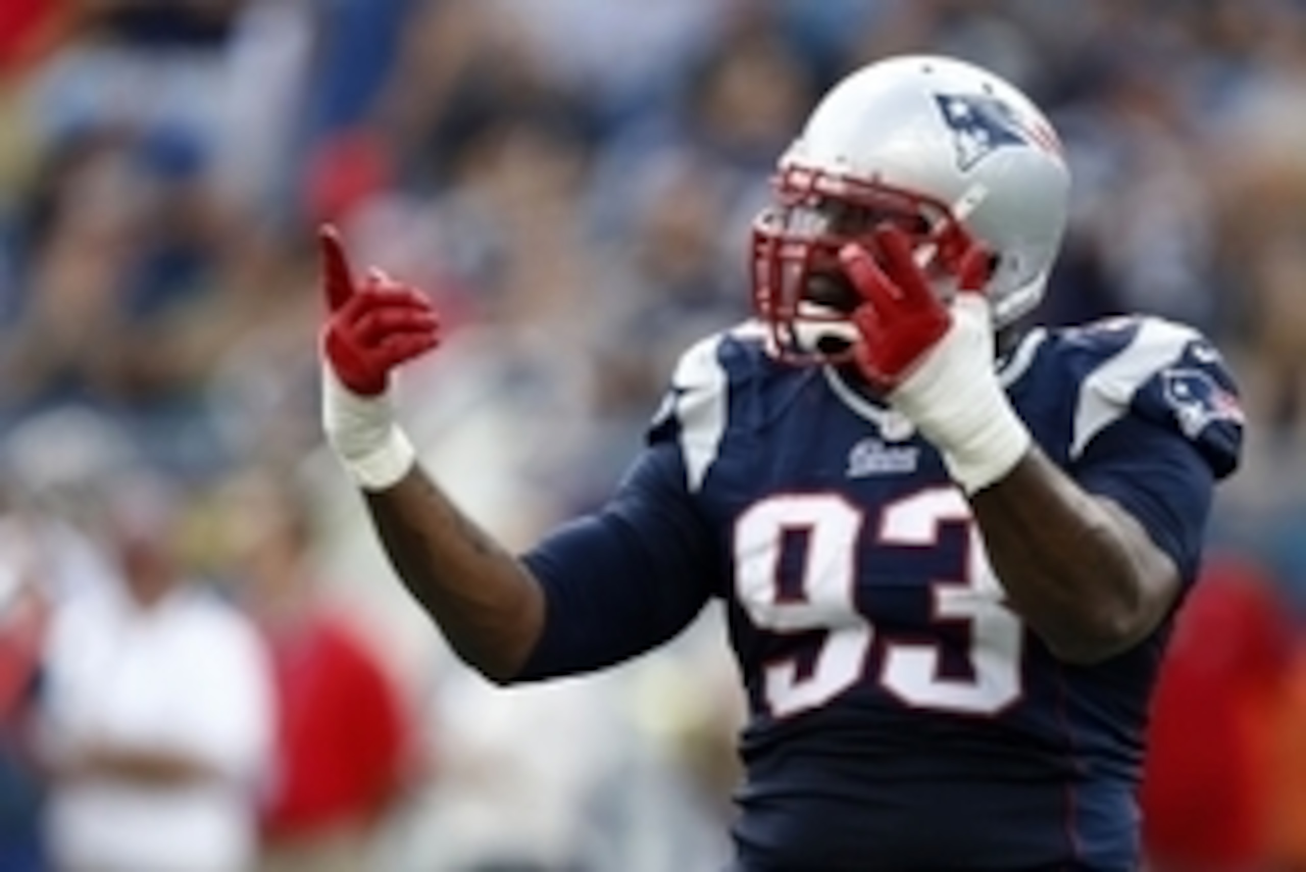 Sep 22, 2013; Foxborough, MA, USA; New England Patriots defensive tackle Tommy Kelly (93) celebrates a sack against the Tampa Bay Buccaneers during the second half at Gillette Stadium. Mandatory Credit: Mark L. Baer-USA TODAY Sports