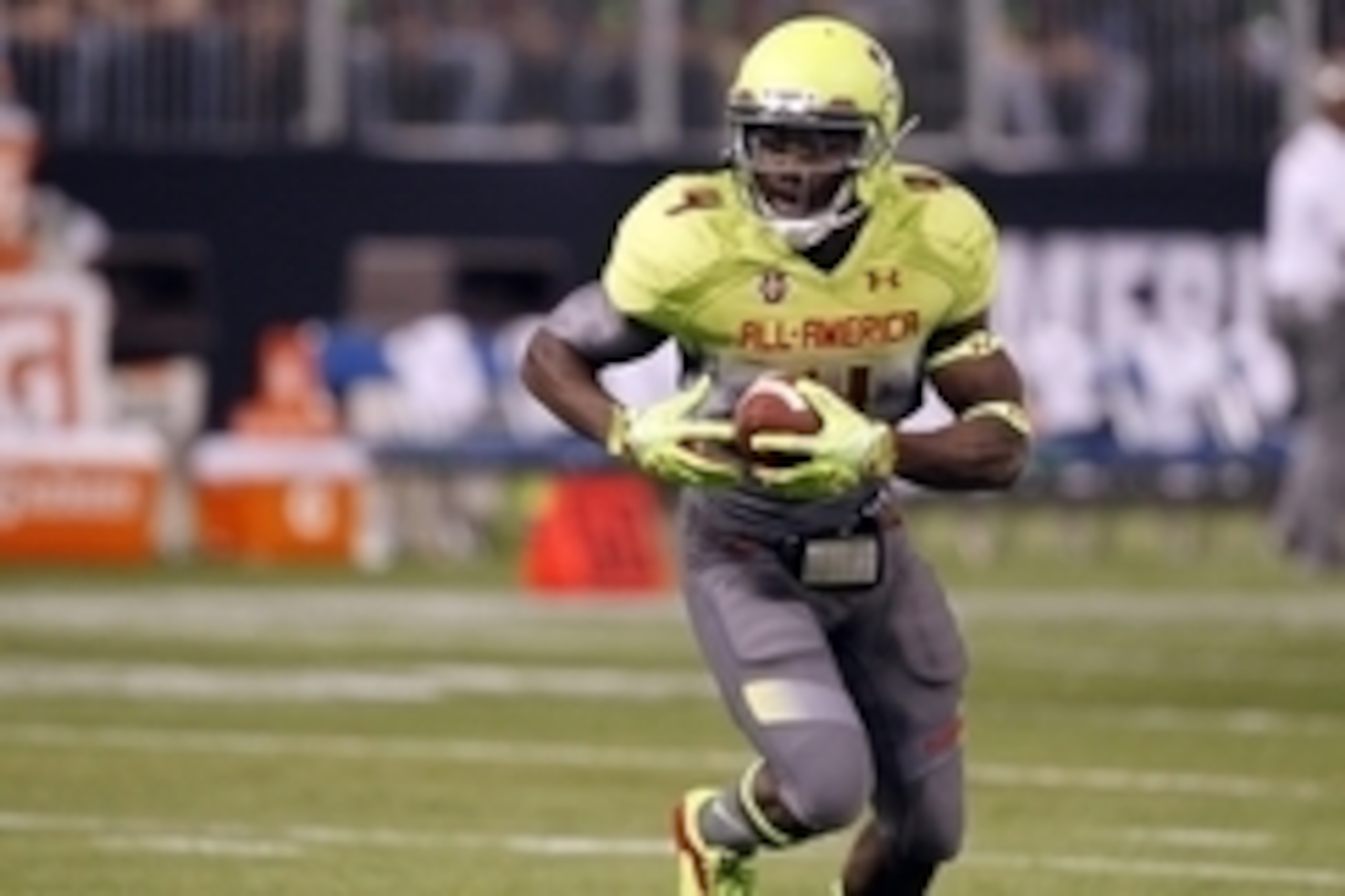 Jan 2, 2014; St. Petersburg, FL, USA; Team Nitro running back Dalvin Cook (4) runs with the ball against Team Highlight during the first half of the Under Armour All America football game at Tropicana Field. Mandatory Credit: Kim Klement-USA TODAY Sports