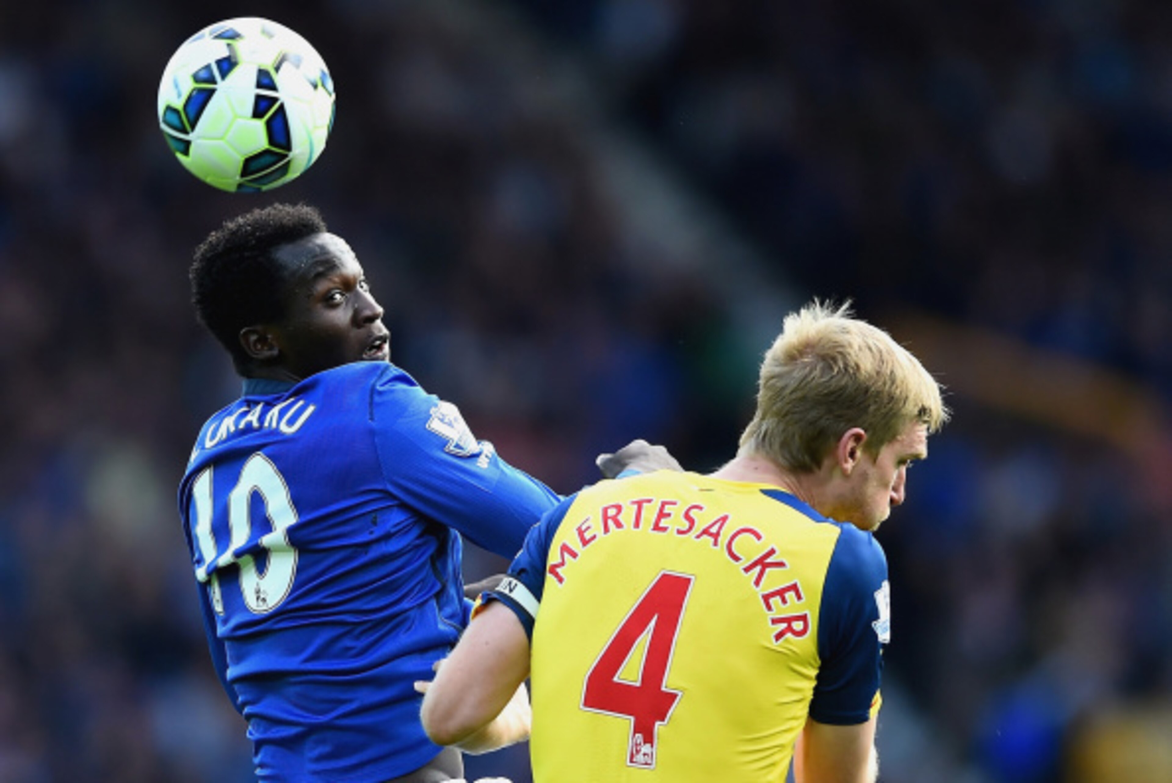 LIVERPOOL, ENGLAND - AUGUST 23: Per Mertesacker of Arsenal competes with Romelu Lukaku of Everton during the Barclays Premier League match between Everton and Arsenal at Goodison Park on August 23, 2014 in Liverpool, England. (Photo by Laurence Griffith LIVERPOOL, ENGLAND - AUGUST 23: Per Mertesacker of Arsenal competes with Romelu Lukaku of Everton during the Barclays Premier League match between Everton and Arsenal at Goodison Park on August 23, 2014 in Liverpool, England. (Photo by Laurence Griffith