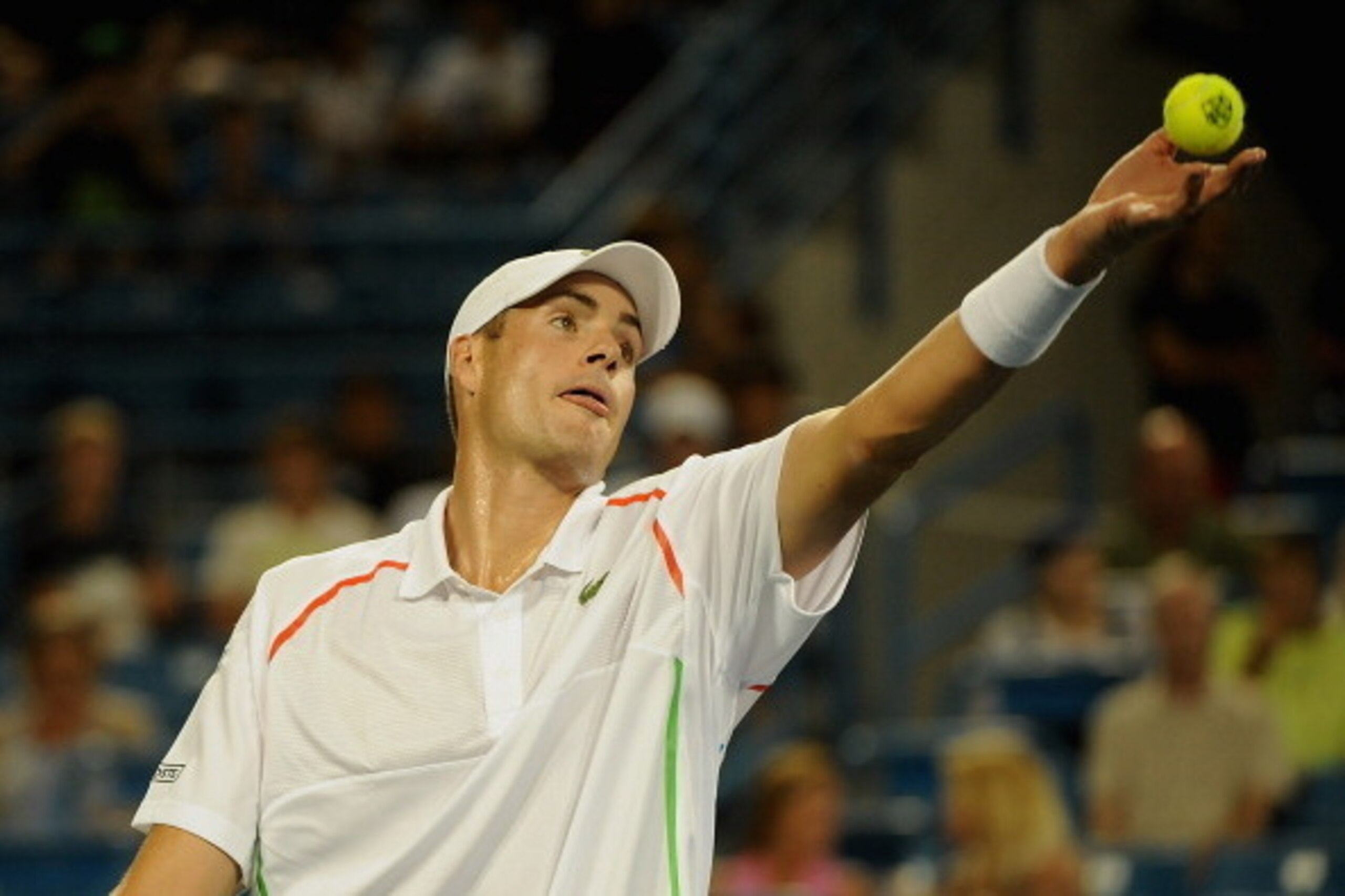 CINCINNATI, OH - AUGUST 11:  John Isner of the United States serves against Kevin Anderson of South Africa during a match on day three of the Western & Southern Open on August 11, 2014 in Cincinnati, Ohio  (Photo by Jonathan Moore/Getty Images)