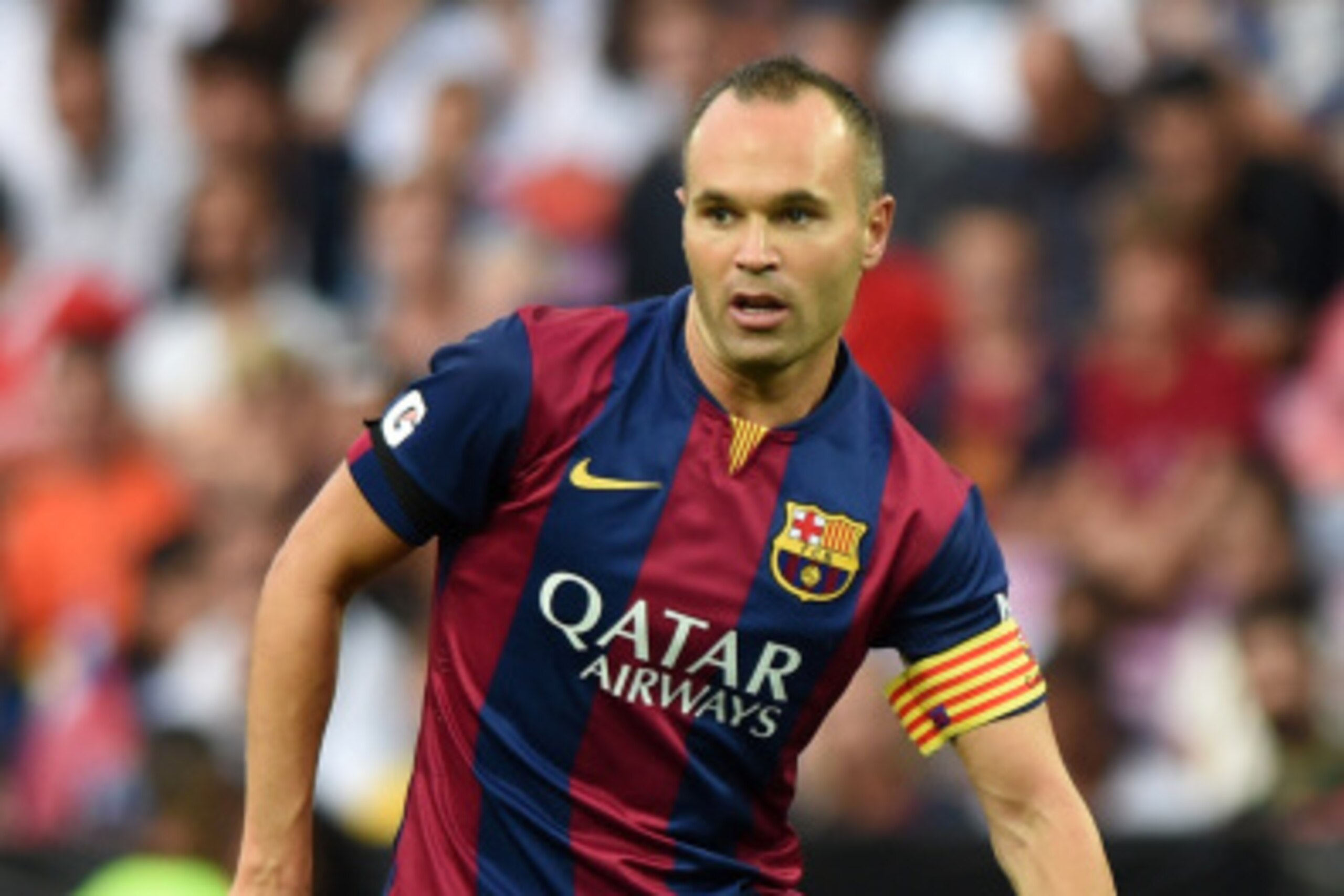 GENEVA, SWITZERLAND - AUGUST 06:  Andres Iniesta of FC Barcelona in action during the pre-season friendly match between FC Barcelona and SSC Napoli on August 6, 2014 in Geneva, Switzerland.  (Photo by Valerio Pennicino/Getty Images)