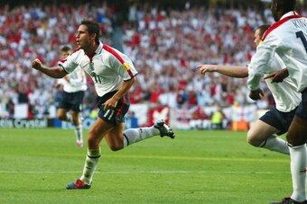 LISBON, PORTUGAL - JUNE 13:  Frank Lampard of England celebrates scoring their first goal during the France v England Group B match in the 2004 UEFA European Football Championships at the Estadio da Luz on 13 June, 2004 in Lison, Portugal.  (Photo by Ben 