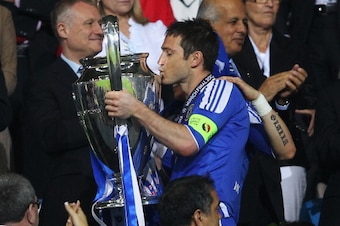MUNICH, GERMANY - MAY 19:  Frank Lampard of Chelsea celebrates with the trophy after their victory in the UEFA Champions League Final between FC Bayern Muenchen and Chelsea at the Fussball Arena München on May 19, 2012 in Munich, Germany.  (Photo by Alex 