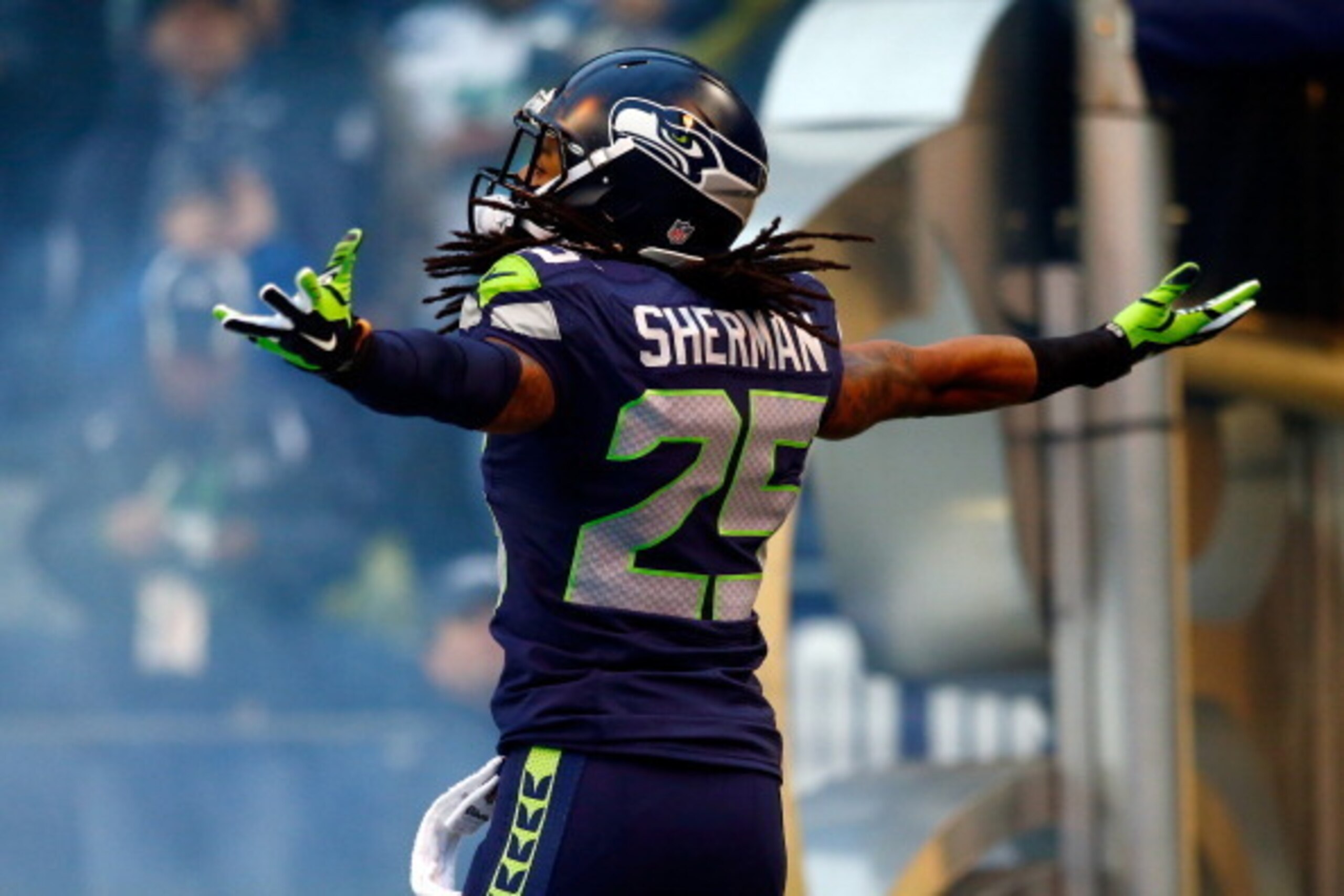 SEATTLE, WA - JANUARY 19:  Cornerback Richard Sherman #25 of the Seattle Seahawks takes the field for the 2014 NFC Championship against the San Francisco 49ers at CenturyLink Field on January 19, 2014 in Seattle, Washington.  (Photo by Jonathan Ferrey/Get
