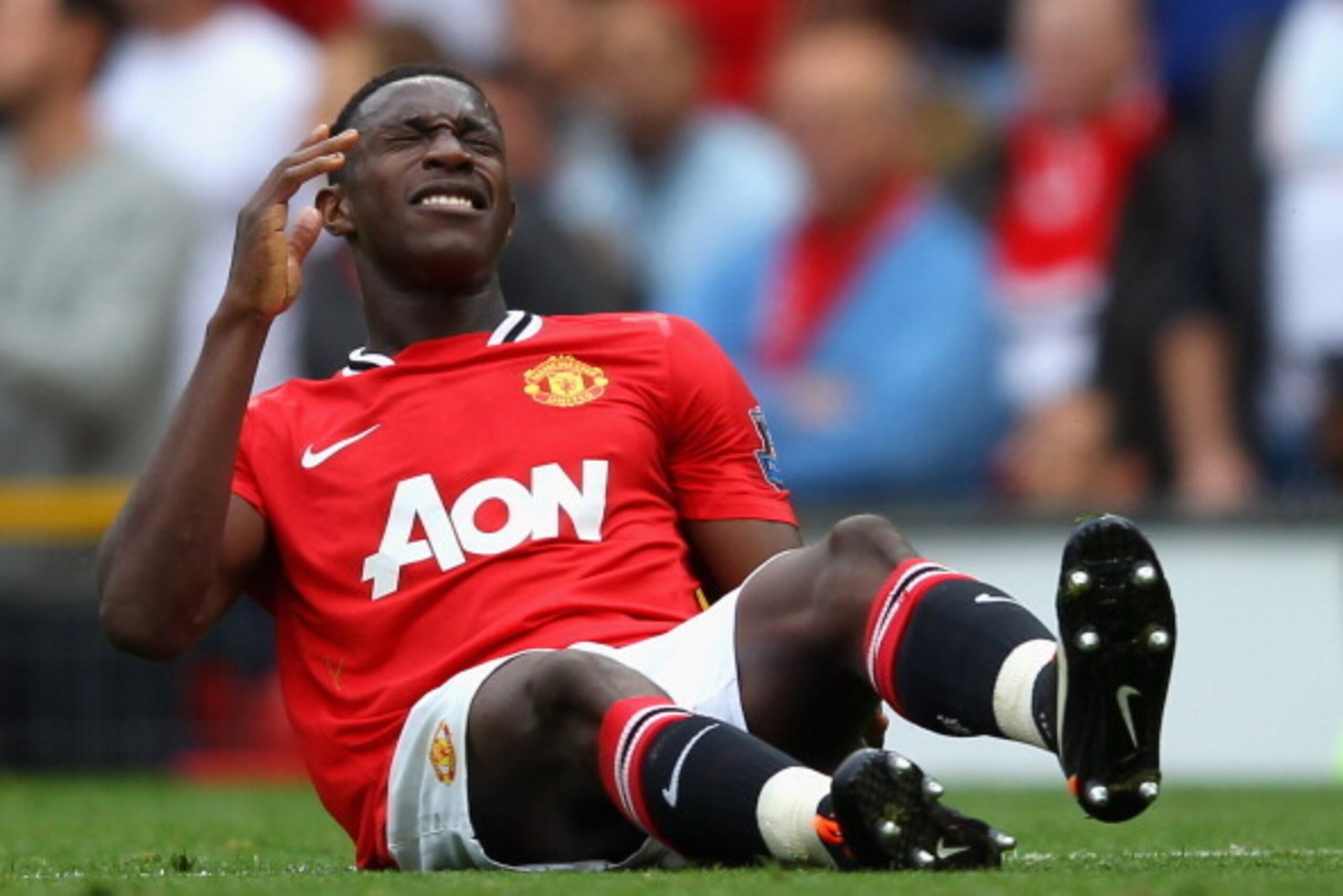 MANCHESTER, ENGLAND - AUGUST 28:  Danny Welbeck of Manchester United lies injured on the pitch during the Barclays Premier League match between Manchester United and Arsenal at Old Trafford on August 28, 2011 in Manchester, England.  (Photo by Alex Livese