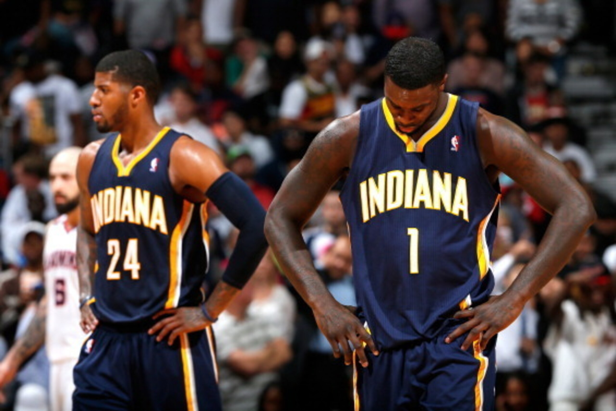 ATLANTA, GA - APRIL 24:  Lance Stephenson #1 and Paul George #24 of the Indiana Pacers react in the final minutes of their 98-85 loss to the Atlanta Hawks in Game 3 of the Eastern Conference Quarterfinals during the 2014 NBA Playoffs at Philips Arena on A