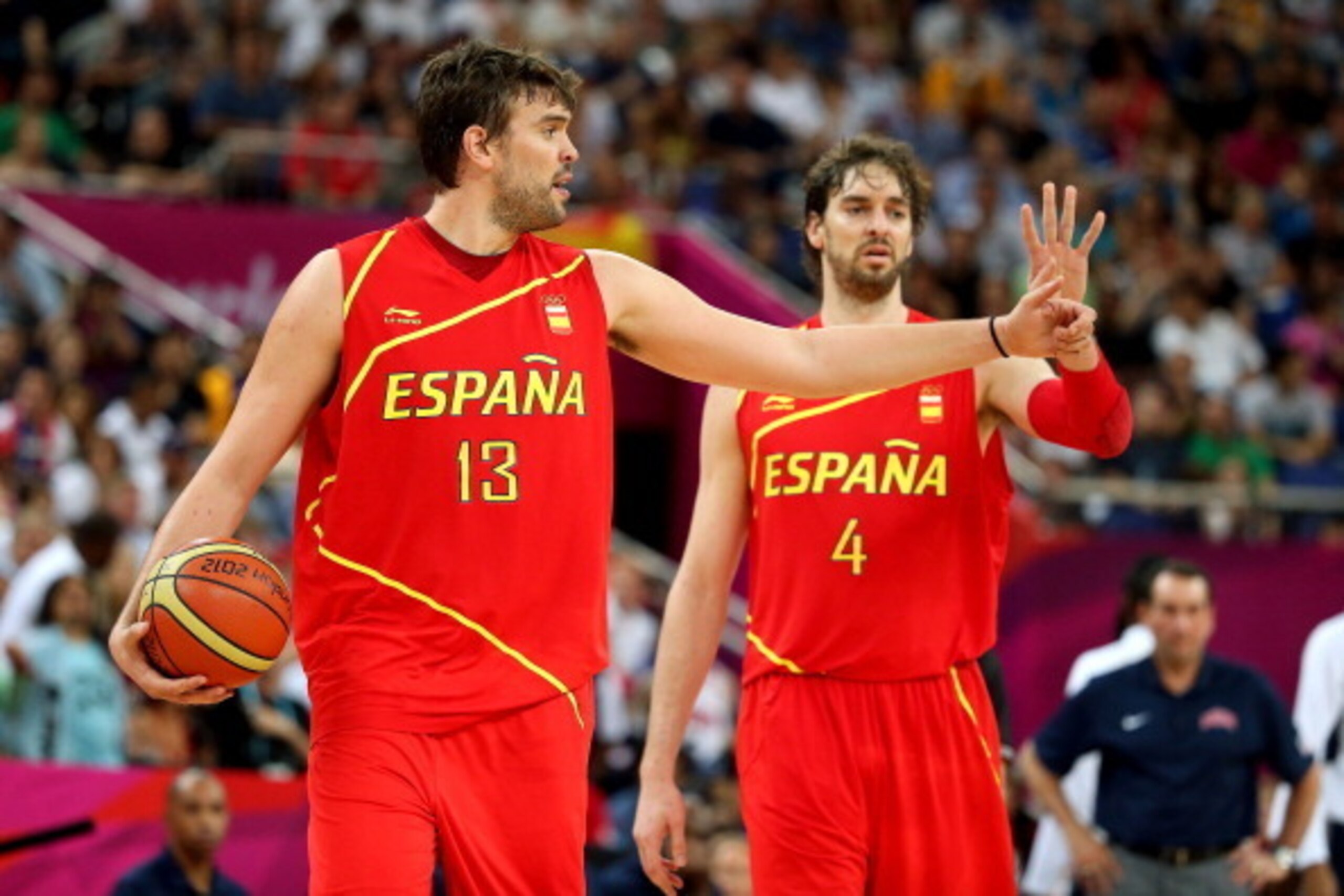 LONDON, ENGLAND - AUGUST 12:  Marc Gasol #13 of Spain and Pau Gasol #4 of Spain communicate to their team mates during the Men's Basketball gold medal game between the United States and Spain on Day 16 of the London 2012 Olympics Games at North Greenwich 