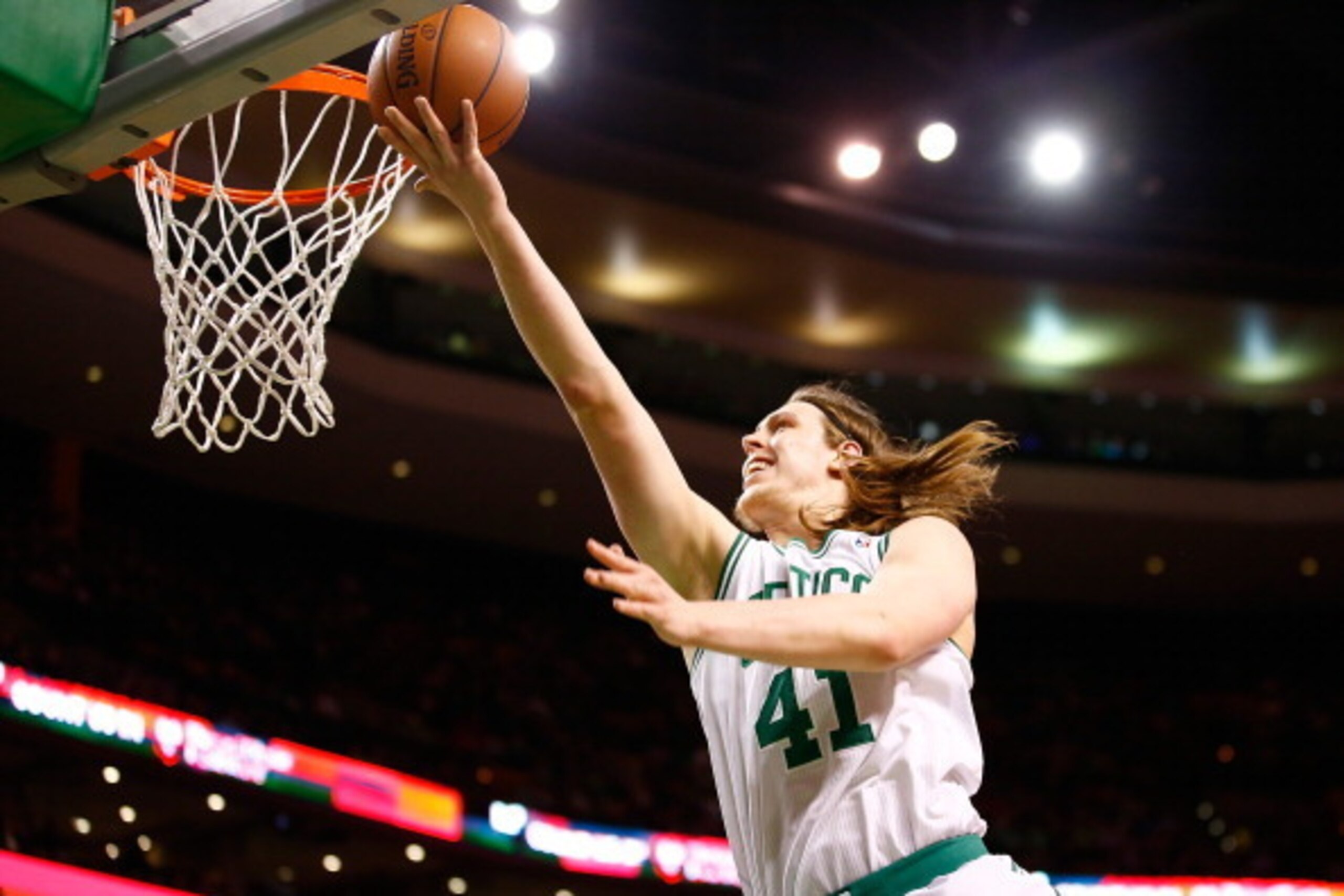 BOSTON, MA - APRIL 16: Kelly Olynyk #41 of the Boston Celtics goes up for a layup against the Washington Wizards in the second quarter during the game at TD Garden on April 16, 2014 in Boston, Massachusetts. NOTE TO USER: User expressly acknowledges and a BOSTON, MA - APRIL 16: Kelly Olynyk #41 of the Boston Celtics goes up for a layup against the Washington Wizards in the second quarter during the game at TD Garden on April 16, 2014 in Boston, Massachusetts. NOTE TO USER: User expressly acknowledges and a