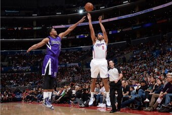 LOS ANGELES, CA - APRIL 12: Jared Dudley #9 of the Los Angeles Clippers shoots the ball during the game against the Sacramento Kings at Staples Center on April 12, 2014 in Los Angeles, California. NOTE TO USER: User expressly acknowledges and agrees that,