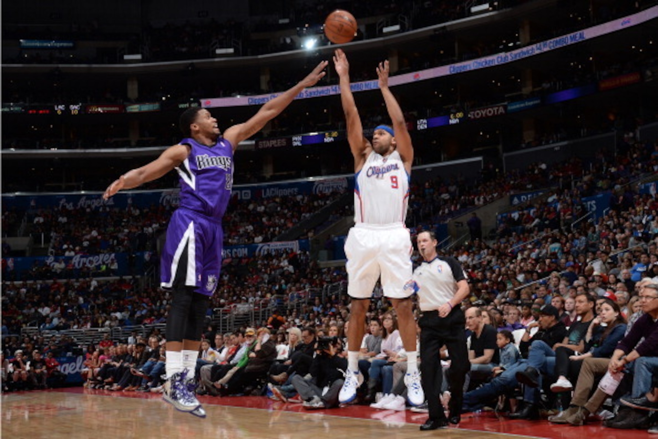 LOS ANGELES, CA - APRIL 12: Jared Dudley #9 of the Los Angeles Clippers shoots the ball during the game against the Sacramento Kings at Staples Center on April 12, 2014 in Los Angeles, California. NOTE TO USER: User expressly acknowledges and agrees that,