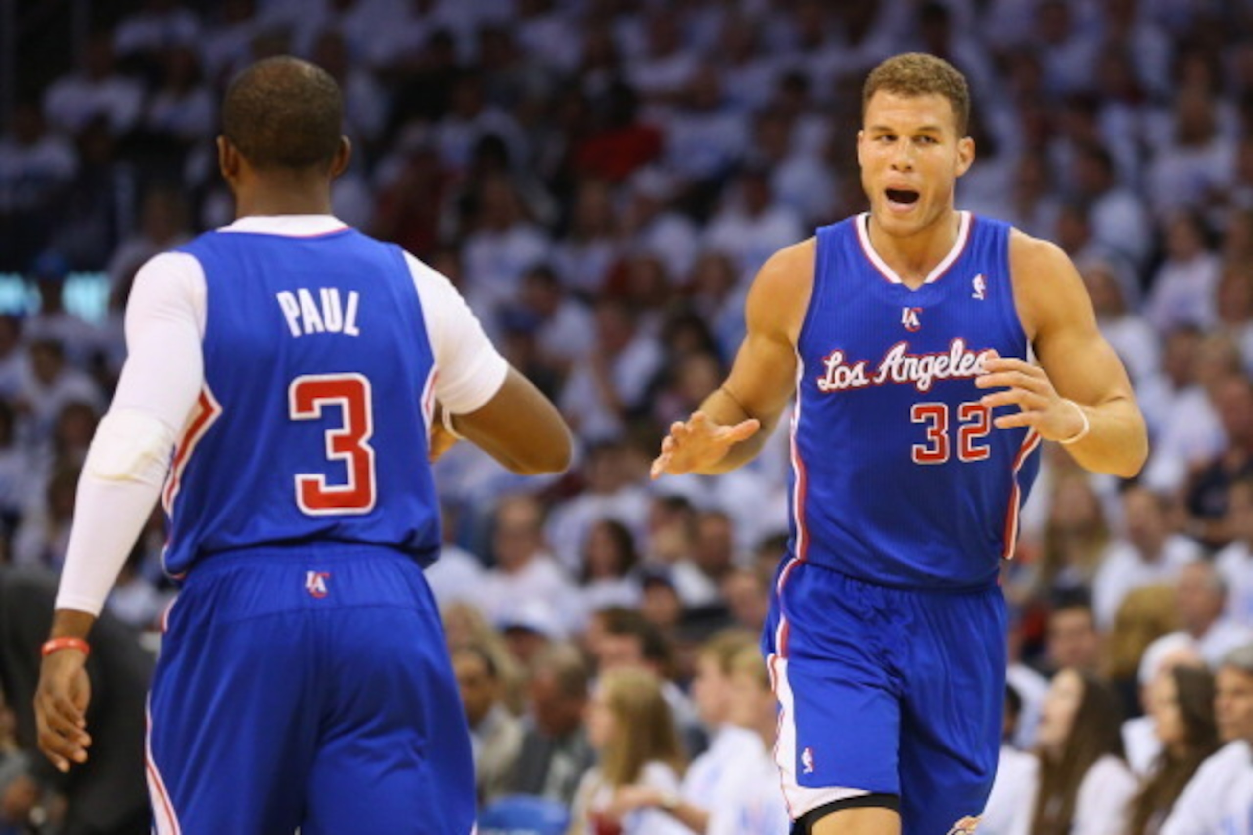 OKLAHOMA CITY, OK - MAY 13:  Chris Paul #3 reacts with Blake Griffin #32 of the Los Angeles Clippers against the Oklahoma City Thunder in Game Five of the Western Conference Semifinals during the 2014 NBA Playoffs at Chesapeake Energy Arena on May 13, 201