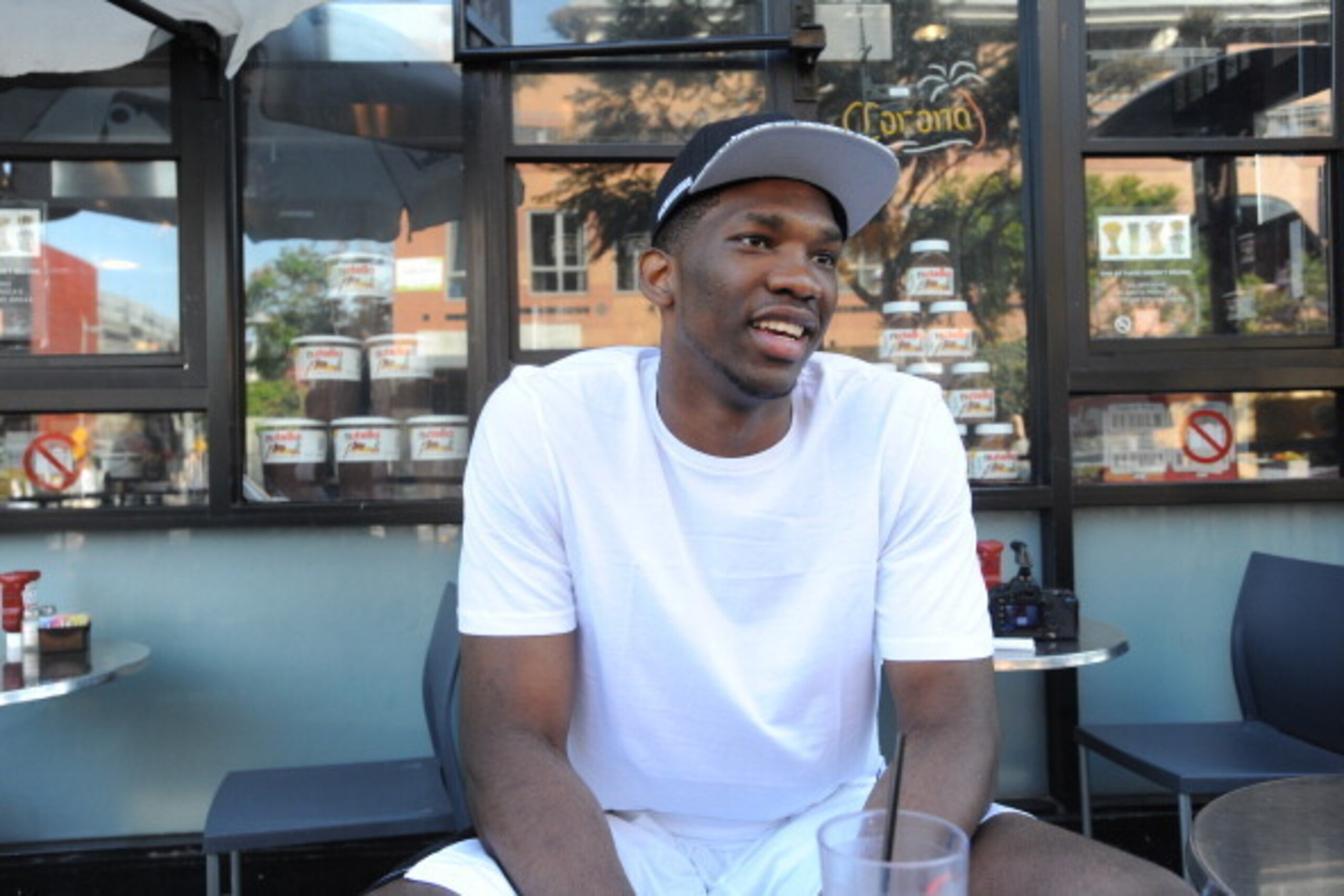 SANTA MONICA, CA - MAY 8:  NBA Draft prospect Joel Embiid behind the scenes on May 8, 2014 at Third Street Promenade in Santa Monica, California. NOTE TO USER: User expressly acknowledges and agrees that, by downloading and/or using this Photograph, user 