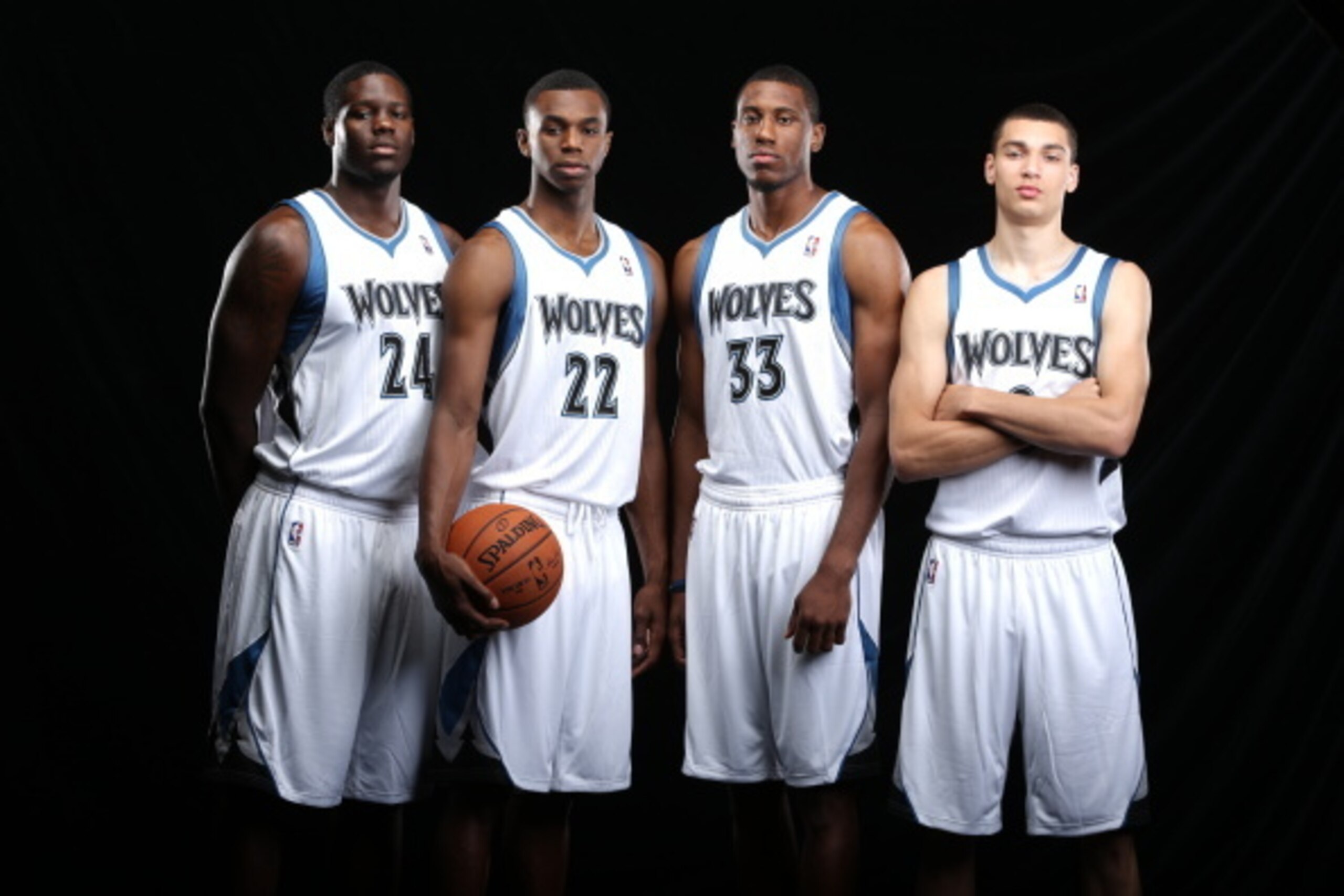 MINNEAPOLIS, MN - AUGUST 26:  Anthony Bennett #24, Andrew Wiggins #22, Thaddeus Young #33 and Zach LaVine #8 of the Minnesota Timberwolves pose for portraits on August 26, 2014 at Target Center in Minneapolis, Minnesota.  NOTE TO USER: User expressly ackn