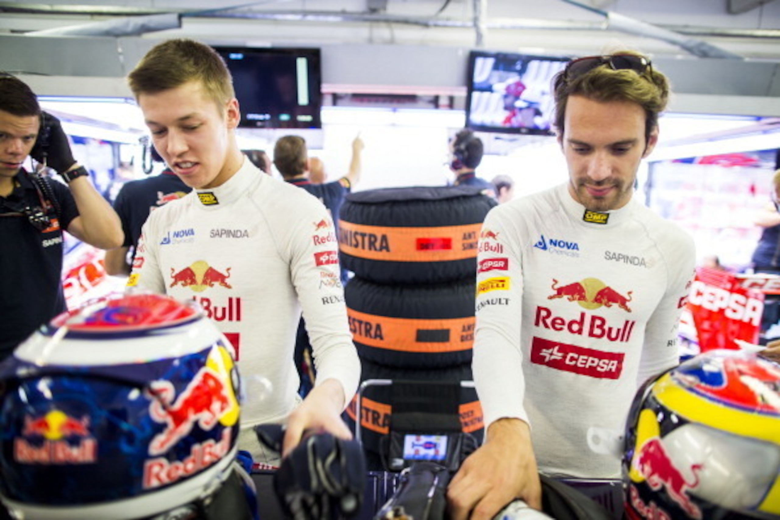 BUDAPEST, HUNGARY - JULY 25:  Daniil Kvyat of Toro Rosso and Russia with Jean-Eric Vergne of Toro Rosso and France ahead of the Hungarian F1 Grand Prix at Hungaroring on July 25, 2014 in Budapest, Hungary.  (Photo by Peter Fox/Getty Images)