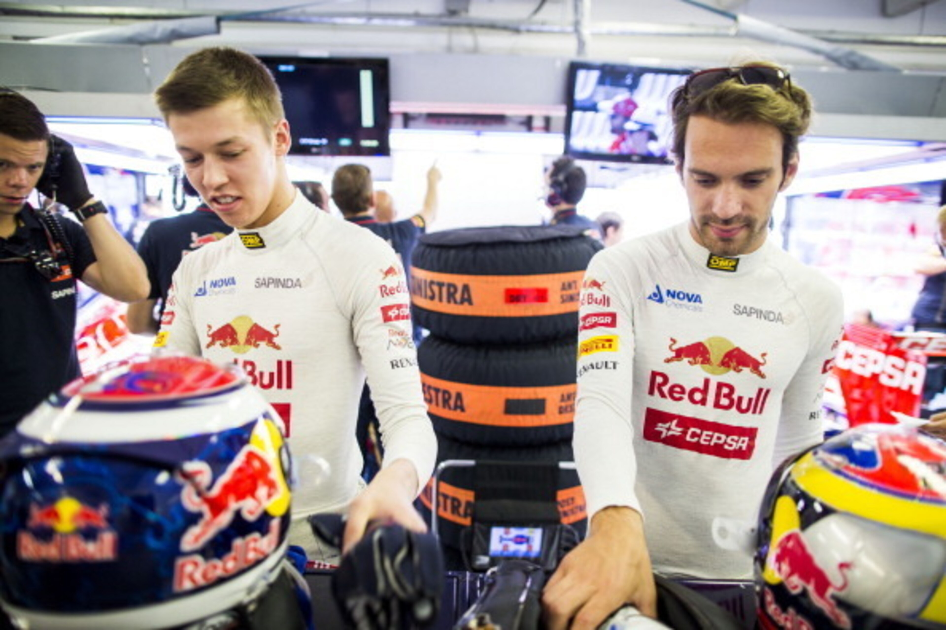 BUDAPEST, HUNGARY - JULY 25:  Daniil Kvyat of Toro Rosso and Russia with Jean-Eric Vergne of Toro Rosso and France ahead of the Hungarian F1 Grand Prix at Hungaroring on July 25, 2014 in Budapest, Hungary.  (Photo by Peter Fox/Getty Images)