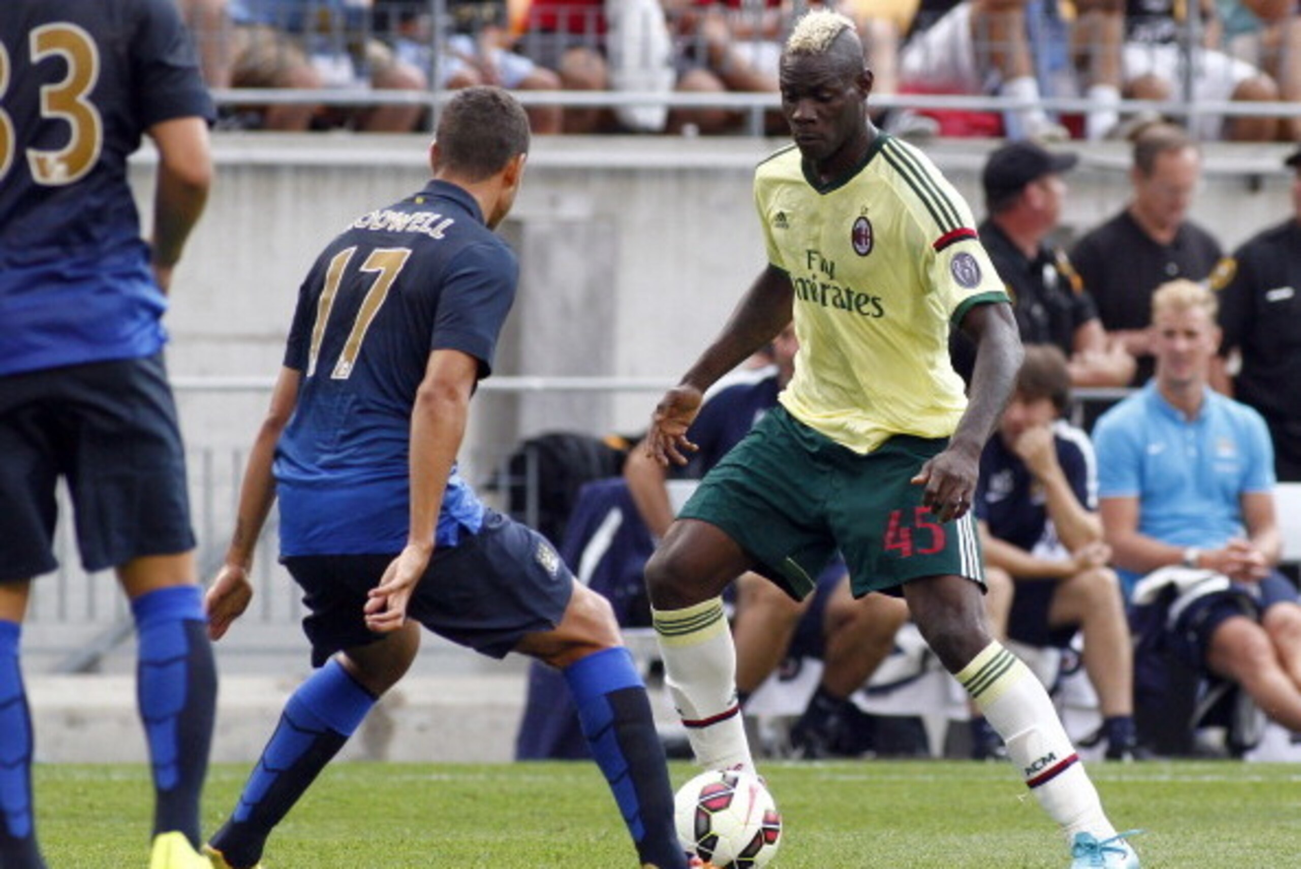 PITTSBURGH, PA - JULY 27:  Mario Balotelli #45 of AC Milan handles the ball against Jack Rodwell #17 of Manchester City during International Champions Cup 2014 at Heinz Field on July 27, 2014 in Pittsburgh, Pennsylvania.  (Photo by Justin K. Aller/Getty I